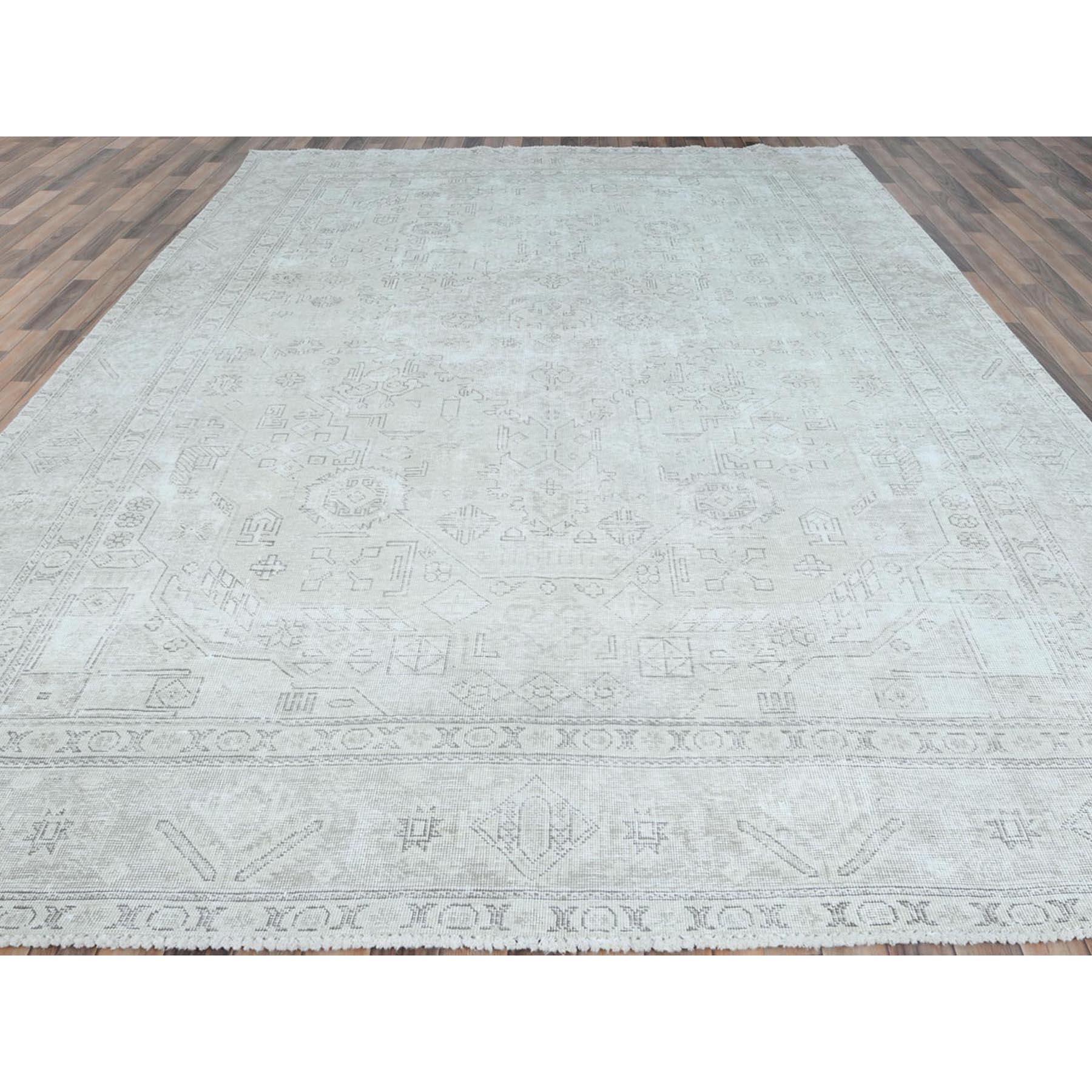Hand-Knotted Ivory Vintage Persian Tabriz Hand Knotted Distressed Look Worn Wool Rug For Sale