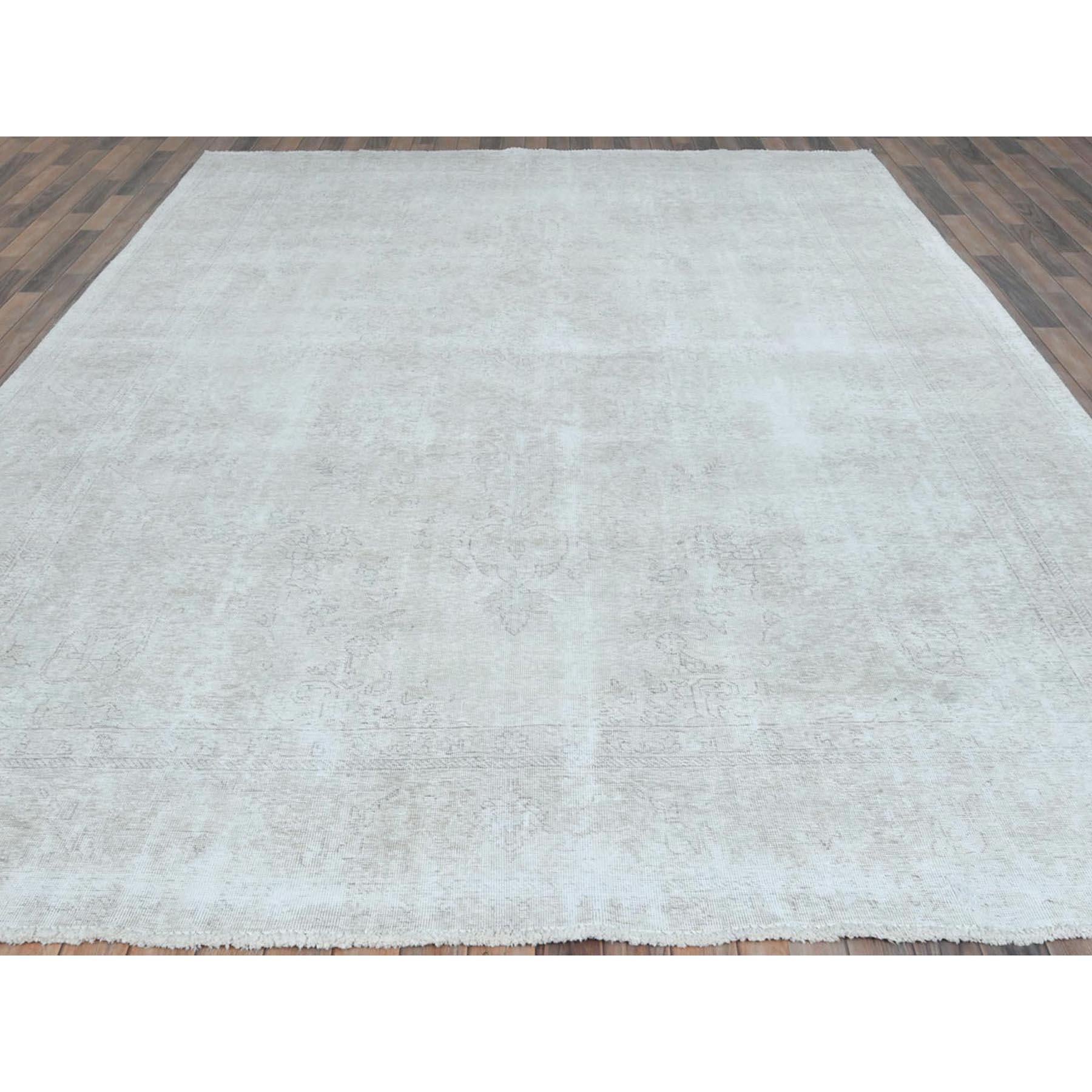 Hand-Knotted Ivory Vintage Persian Tabriz Hand Knotted Distressed Look Worn Wool Rug For Sale