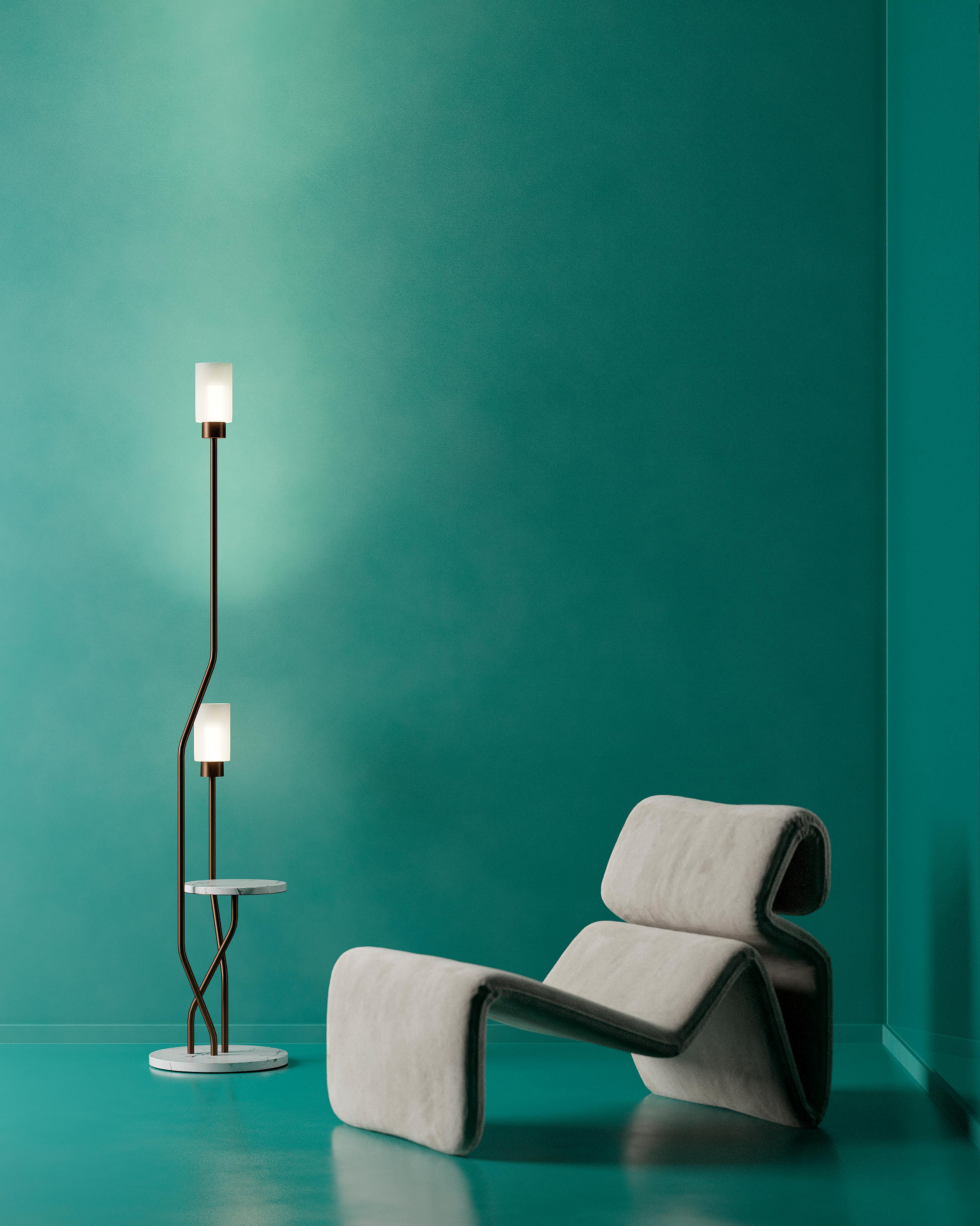 Ivy Floor Lamp by G.Luce
Dimensions: D 40 x H 182 cm
Materials: Steel frame in light satin gold finish and Emperador marble table, or satin bronze and Calacatta gold marble table. Opal glass diffuser. 
Weight: 11.2 Kg. 

G.Luce is the result of a