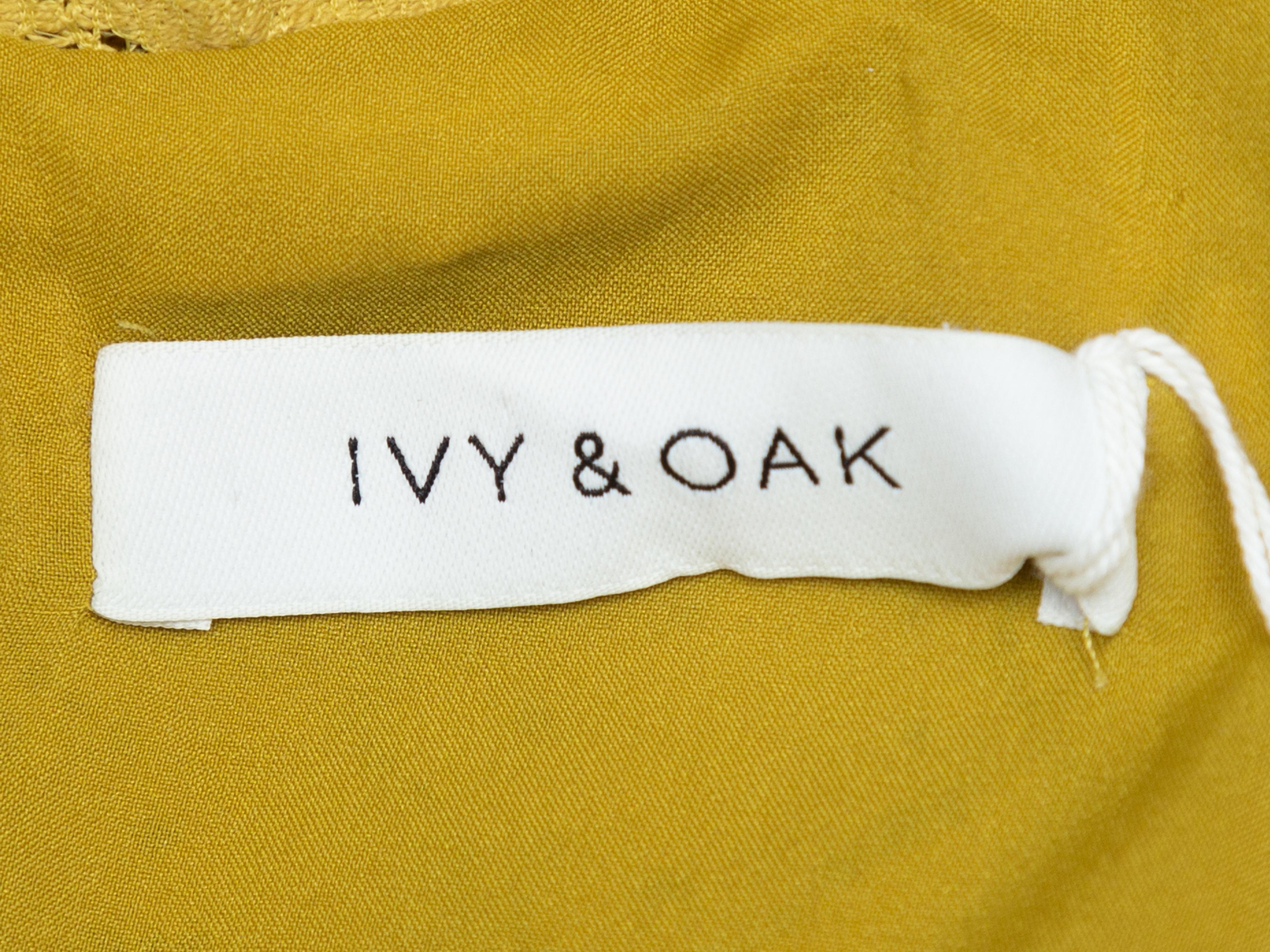 Product details: Yellow lace sleeveless maxi dress by Ivy & Oak. High neck. Zip closure at back. Designer size 34. 30