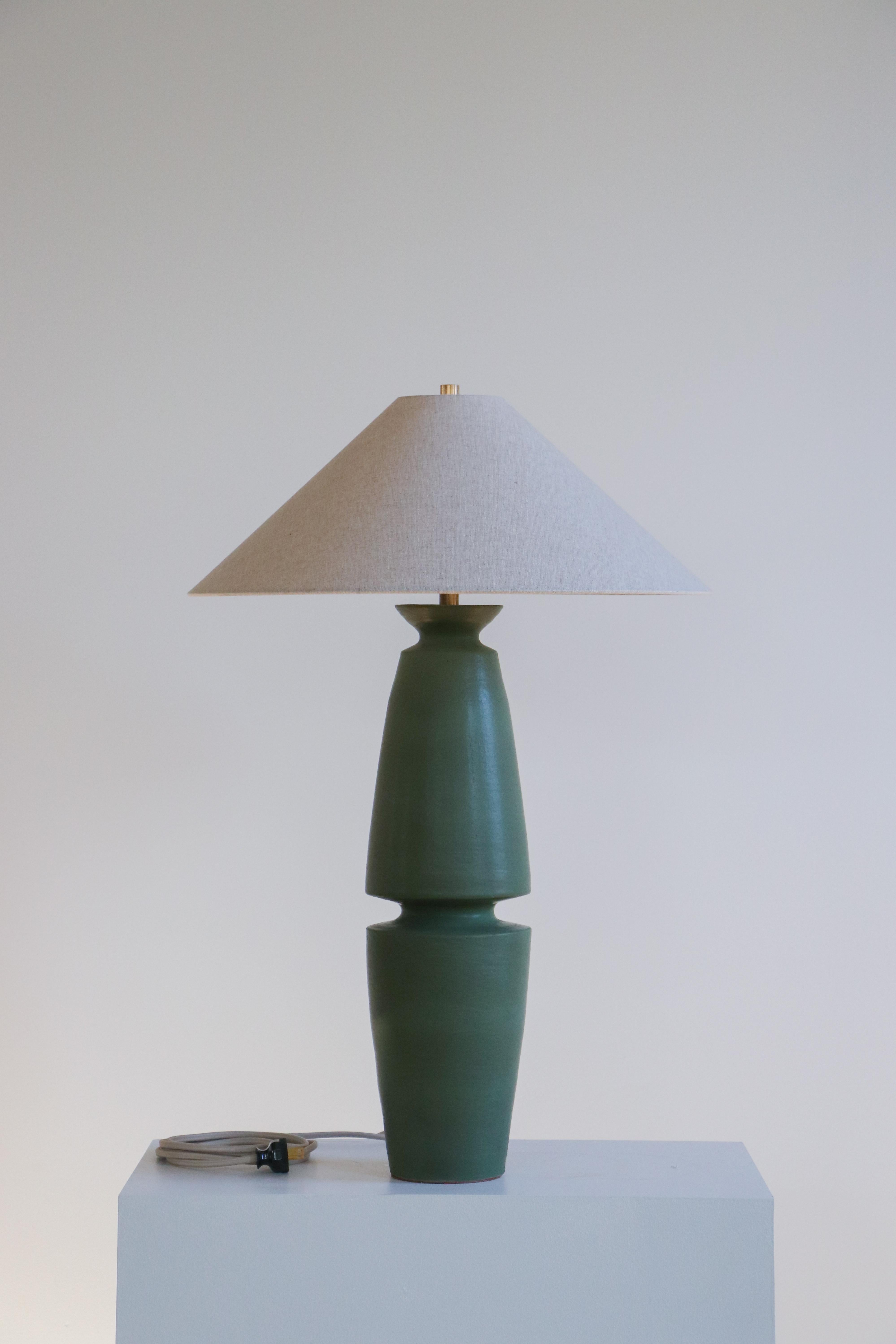 Ivy Serena Table Lamp by Danny Kaplan Studio
Dimensions: ⌀ 51 x H 71 cm
Materials: Glazed Ceramic, Unfinished Brass, Linen

This item is handmade, and may exhibit variability within the same piece. We do our best to maintain a consistent product,