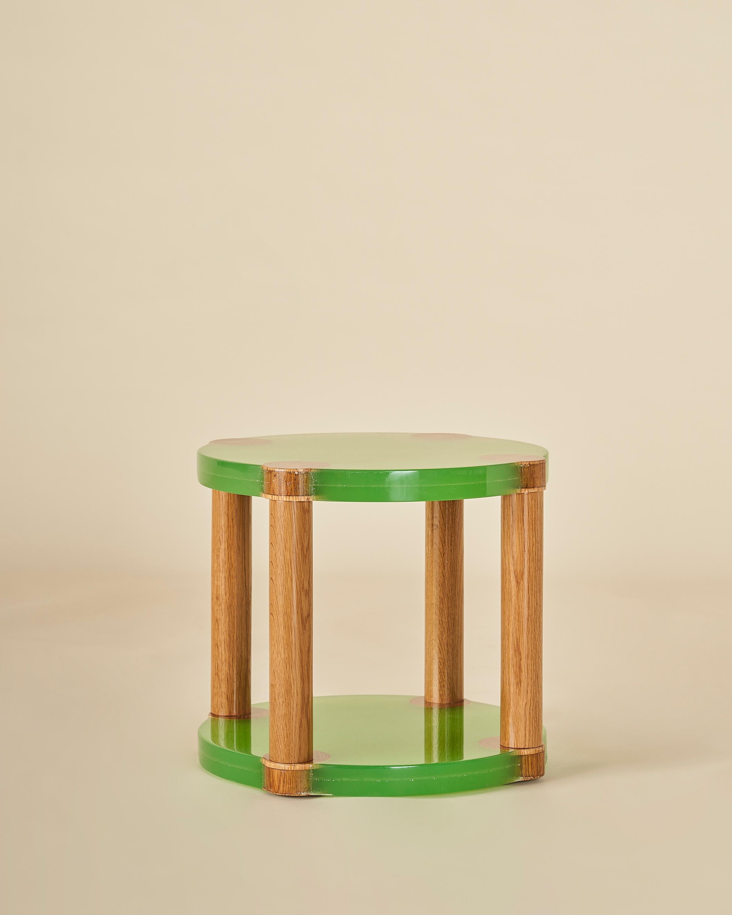 An eye-catching, yet timeless, handmade cast resin side table with four rounded solid oak legs. Each resin piece is hand-poured, so natural variation will occur. 

Our collection pays homage to the everlasting idea of home, a place that is alive as