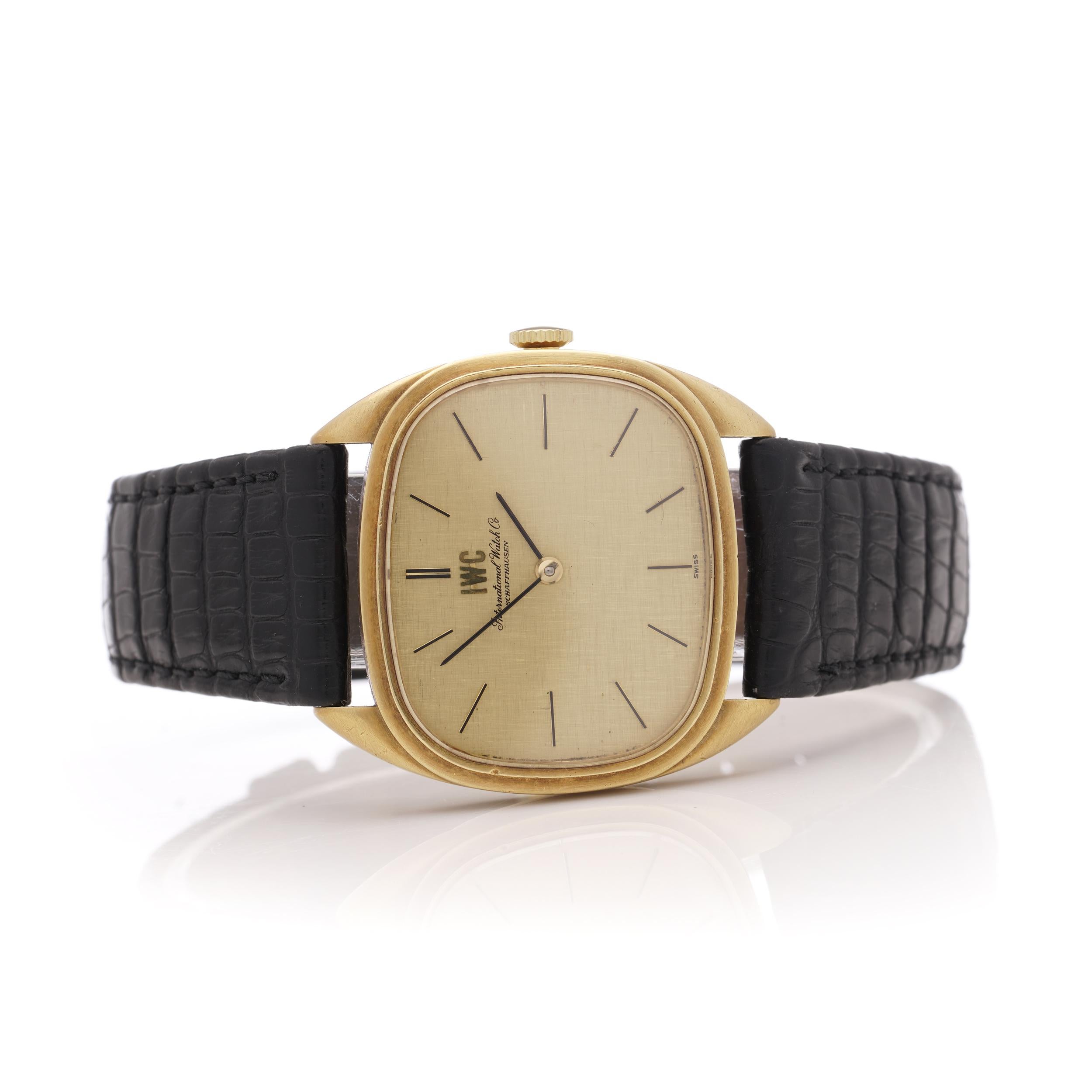Women's IWC 18k. yellow gold men's manual winding wristwatch, 1980's  For Sale