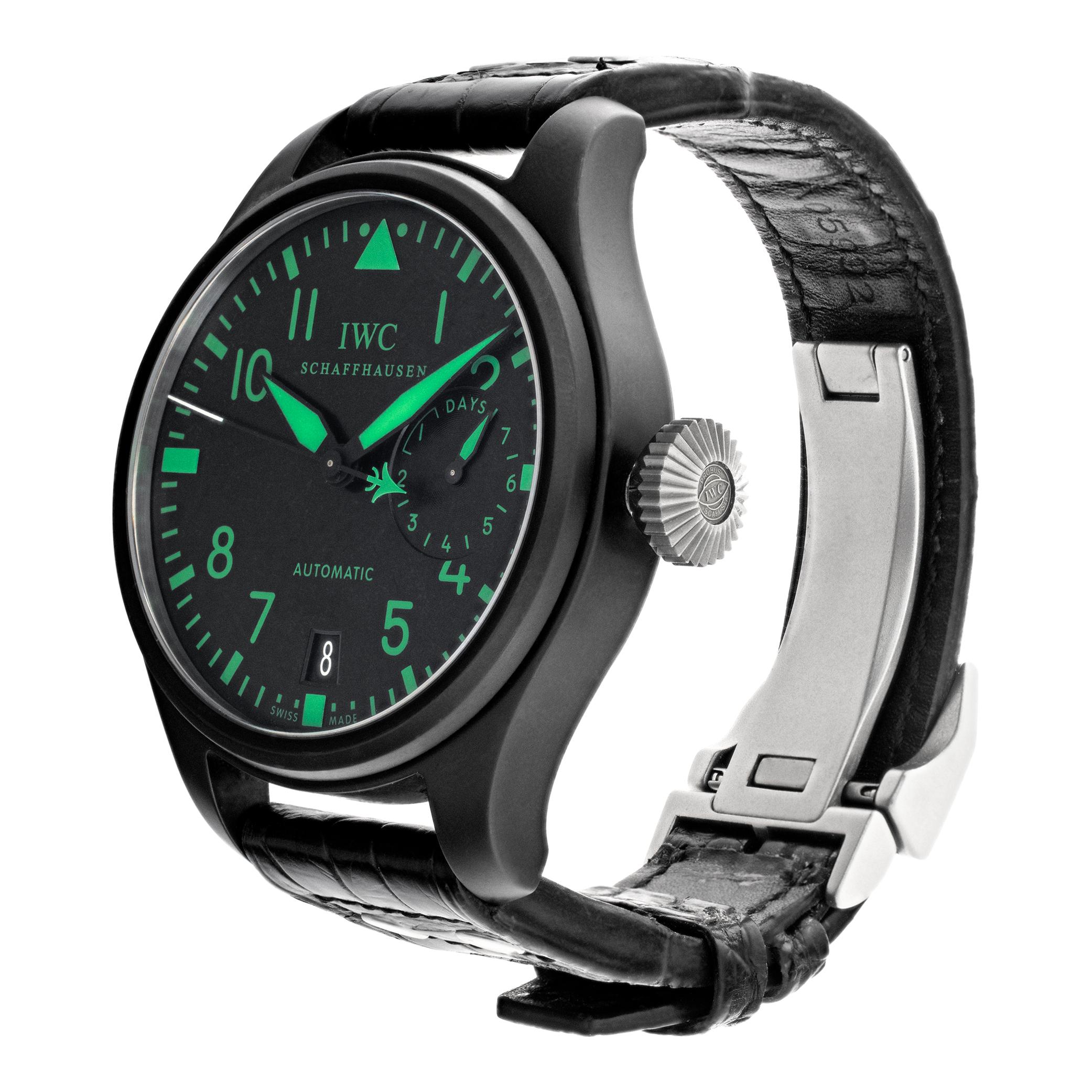 IWC Big Pilot watch Top Gun Boutique Edition in a black ceramic case with black dial and green luminescence markers on a black calkskin leather strap & stainless steel deployant buckle. Auto w/ sweep seconds, date and power reserve. 48 mm case size.