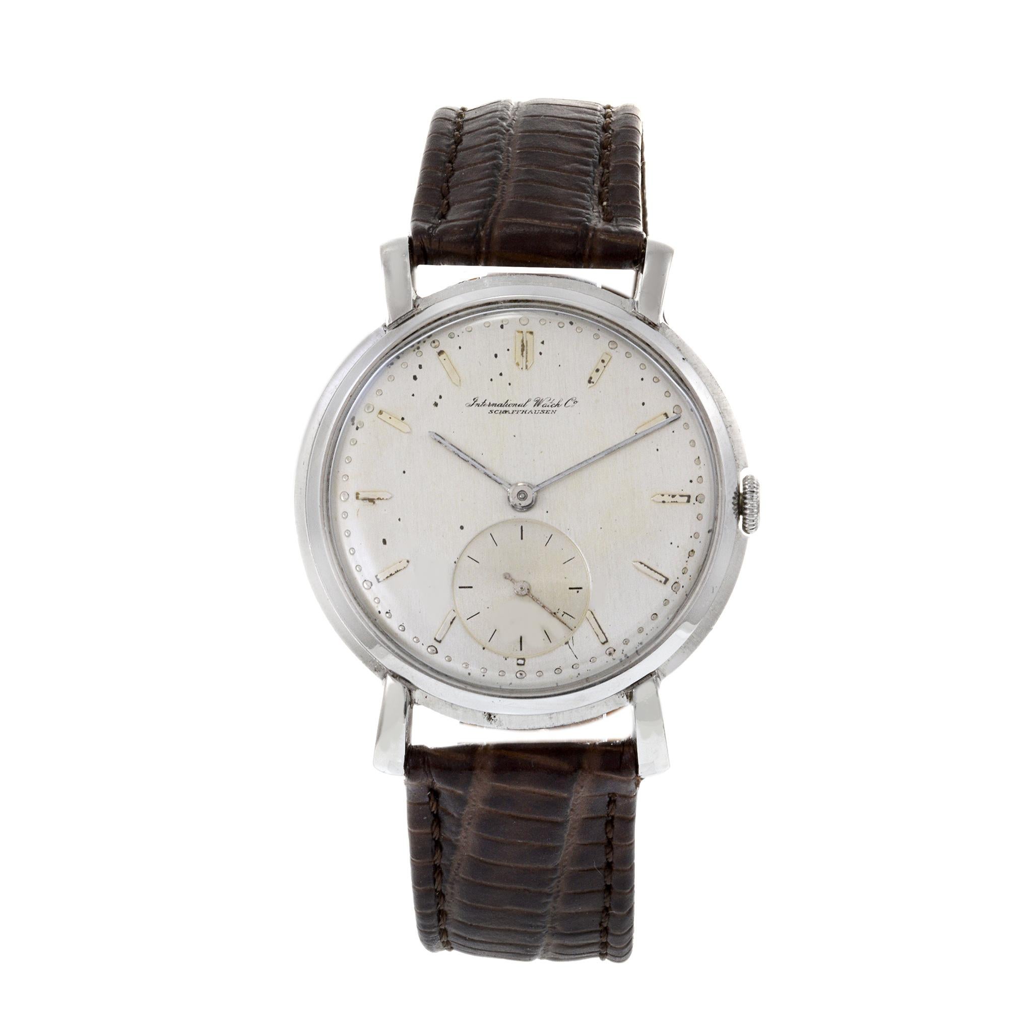 This is an iconic 1950's IWC caliber 88 manual wind Calatrava. The watch was considered jumbo size for the decade at 36mm considering that most watches were under 32mm in size. This watch features flared lugs and the a sub second dial at 6 o'clock.