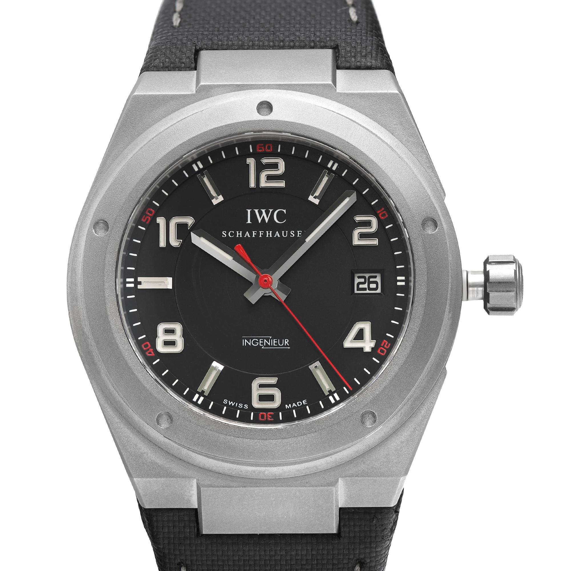 Pre-owned IWC Ingenieur 42.5 mm Titanium Black Dial Men's Automatic Watch IW322703. Exclusively for Mercedes AMC.  Slightly cracks on the band near buckle closing on top Hole. Little Scratch on a Side of the Case. This Beautiful Timepiece Feature a