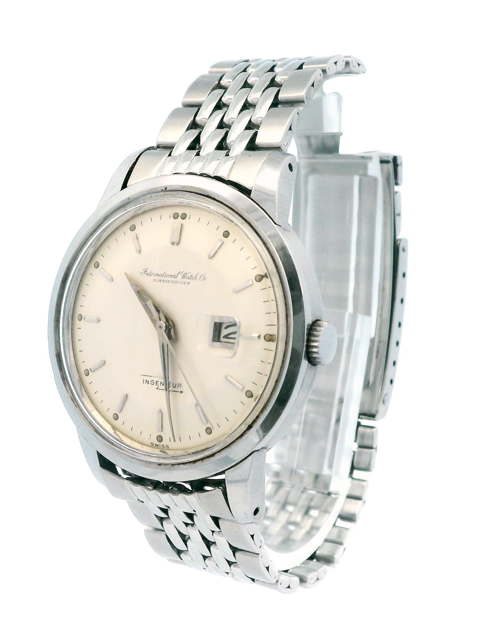 IWC Ingenieur Mens Watch. 36mm stainless steel case with stainless steel bezel. Silver dial with steel hands and index hour markers. Minute marker around the outer dial. Date display at the 3 o'clock position-this watch ensures optimal performance