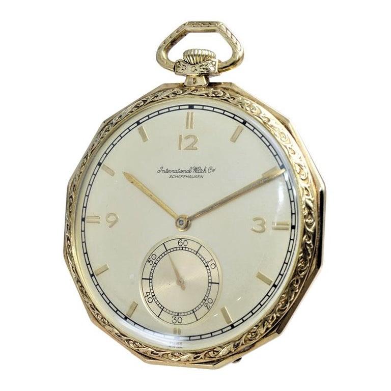 FACTORY / HOUSE:  I.W.C  International Watch Company
STYLE / REFERENCE:  Pocket Watch / Opened Face
METAL / MATERIAL: 14 Kt Yellow Gold 
DIMENSIONS: Diameter 50mm
CIRCA: 1930's
MOVEMENT / CALIBER: Manual Winding / 17 Jewels 
DIAL / HANDS: Original