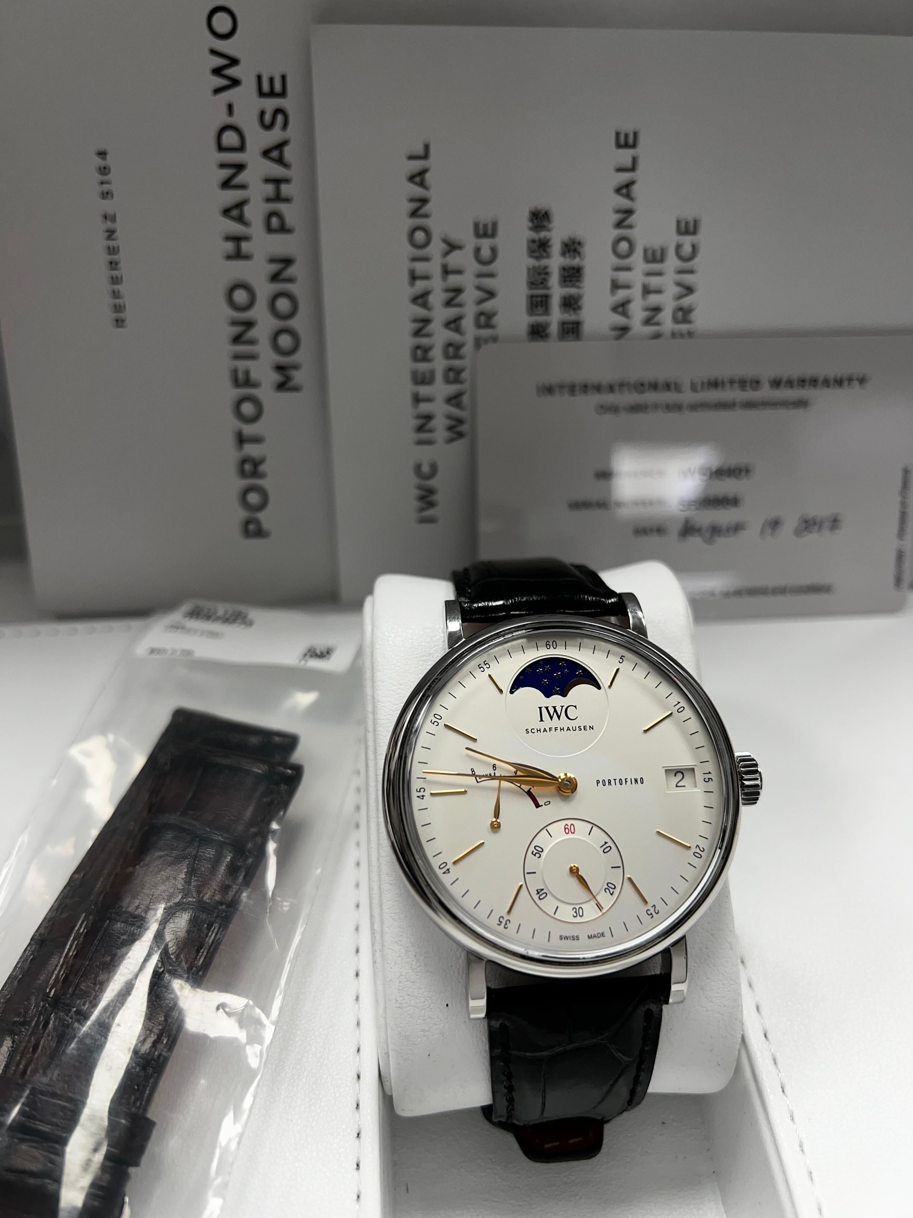 Style Number: IW516401
Year: 2017
Model: Portofino Hand-Wound Moon Phase 
Case Material: Stainless Steel 
Band: Leather 
Bezel:  Stainless Steel 
Dial: Silver
Face: Sapphire Crystal 
Case Size: 45mm 

 Includes: 
-IWC Box & Paper
-Certified