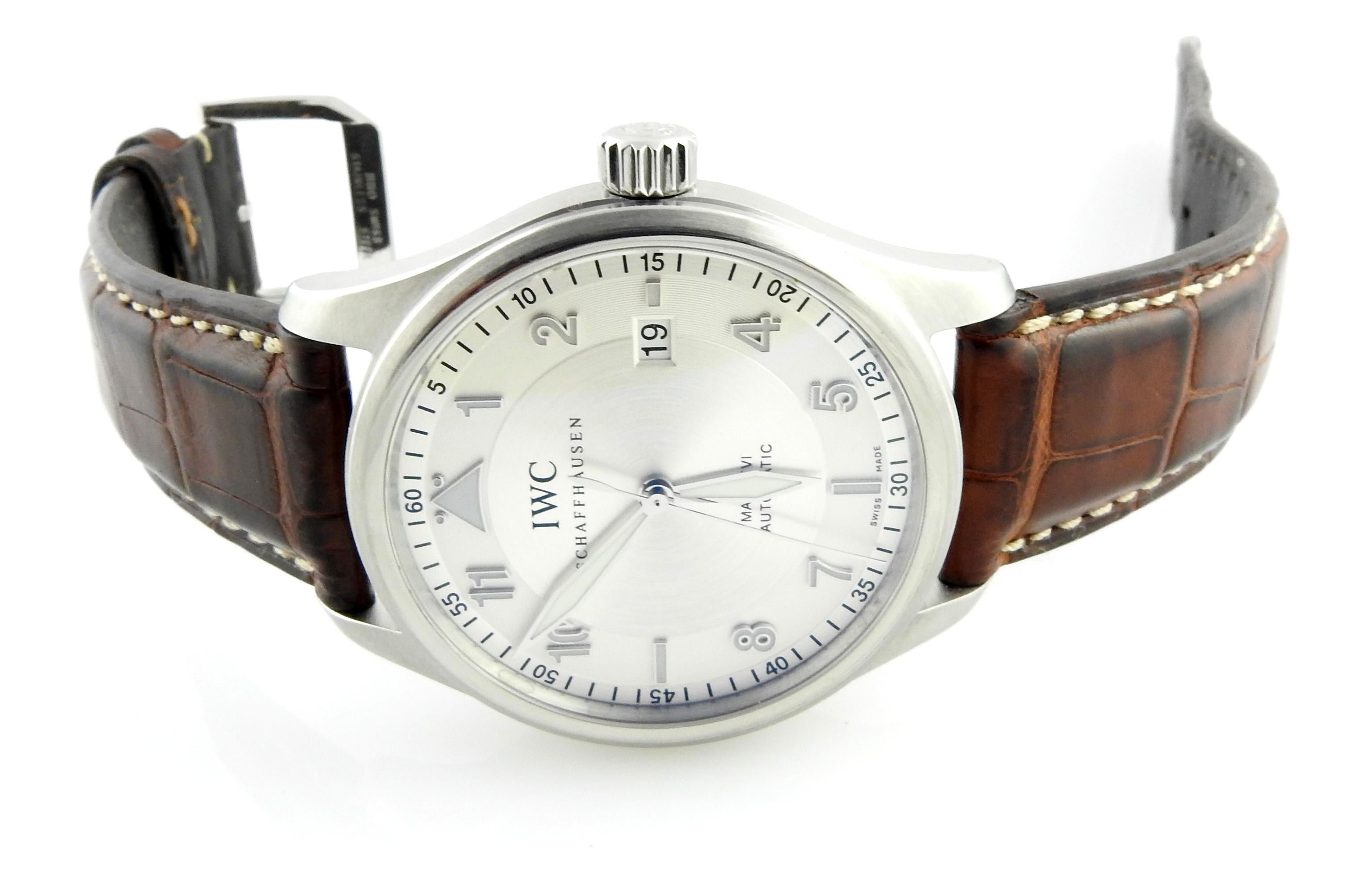 IWC Mark XVI Pilot Spitfire Men's Watch

Model: IW 3255-02
Serial: 3637774

Stainless Steel case with Spitfire Silver Dial

Case is 39mm

Automatic Movement

Brown leather IWC band with stainless clasp

Watch measures approx. 9 1/4 