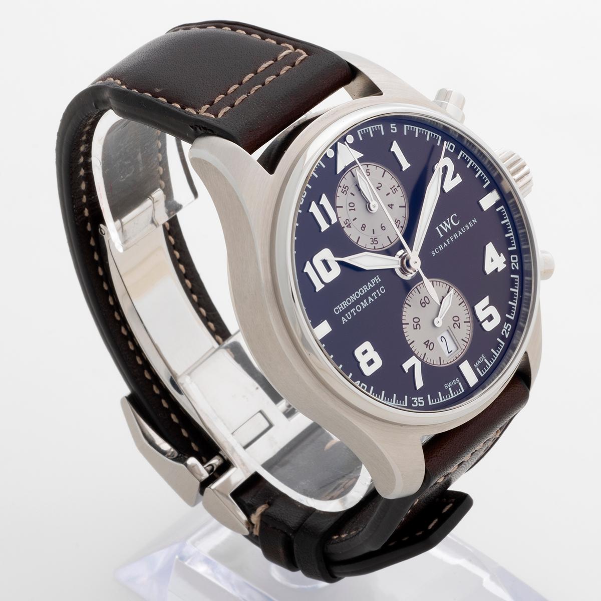 Our rare special edition IWC Pilot Chronograph, Edition Saint Antoine D'Exupery, reference IW387806, features a 43mm stainless steel case with brown sunray dial and leather strap with deployant clasp. This reference distinguishes itself with an in