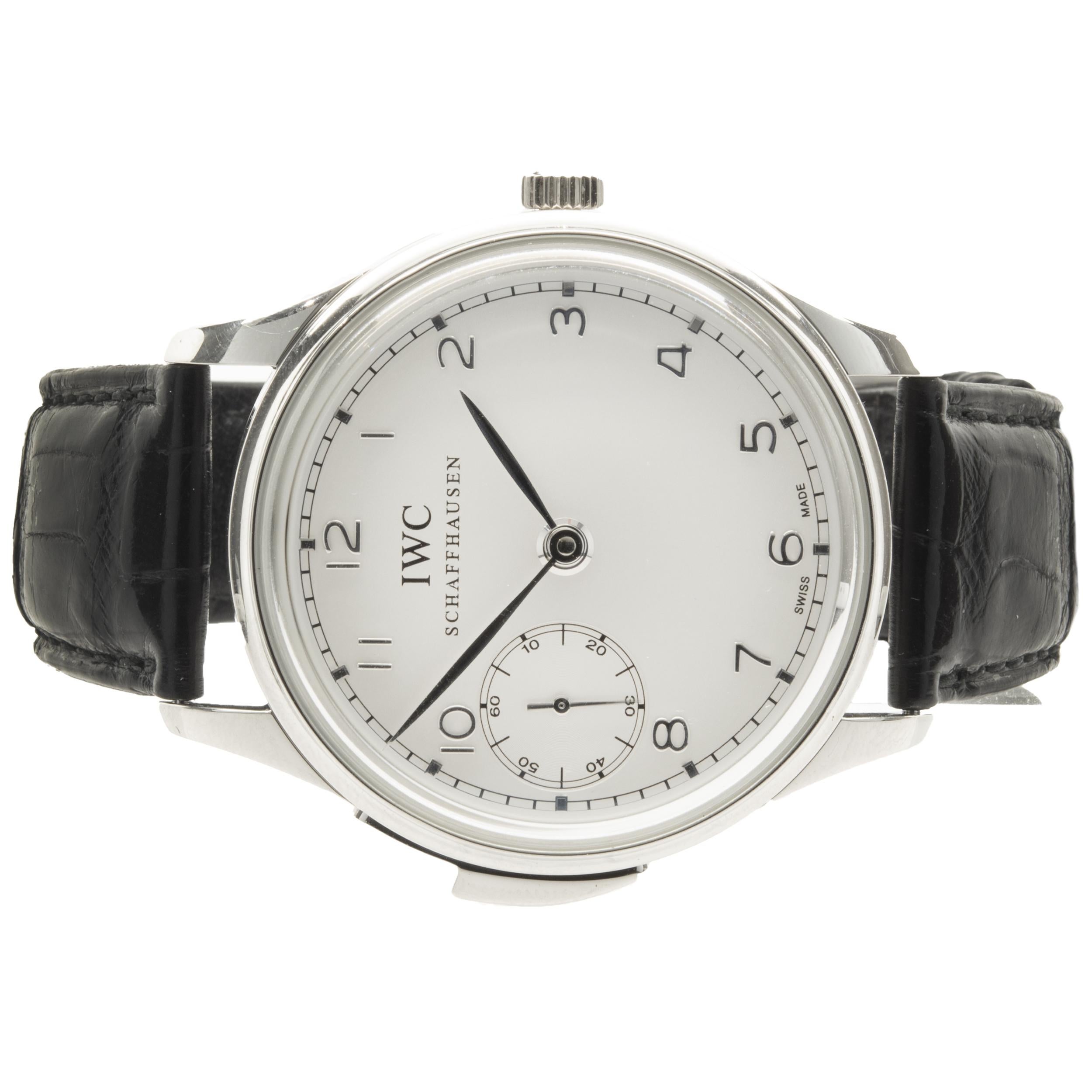Brand: IWC
Movement: manual
Function: hour, minutes, seconds, minute repeater
Case: 42mm platinum round case, sapphire crystal
Band: black crocodile strap, integrated clasp
Dial: silver arabic dial
Reference #: IW5242
Serial #:
