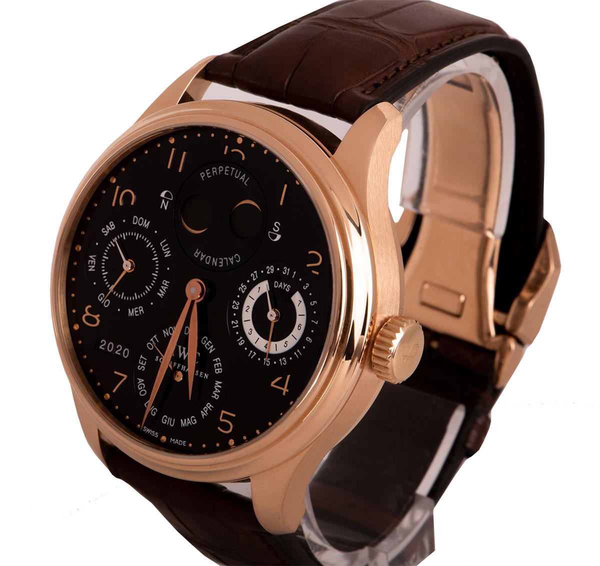 A 44 mm 18k Rose Gold Portugieser Perpetual Calendar Gents Wristwatch, black dial with applied arabic numbers, date and 7 day power reserve indicator at 3 0'clock, month sub-dial at 6 0'clock, year aperture between 7 and 8 0'clock, small seconds and