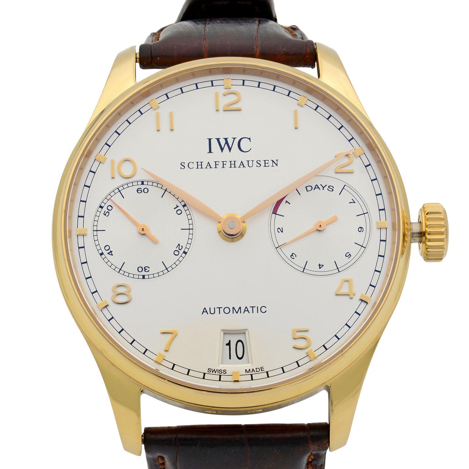 This pre-owned IWC Portuguese  IW500101 is a beautiful men's timepiece that is powered by mechanical (automatic) movement which is cased in a yellow gold case. It has a round shape face, date indicator, power reserve indicator, small seconds subdial
