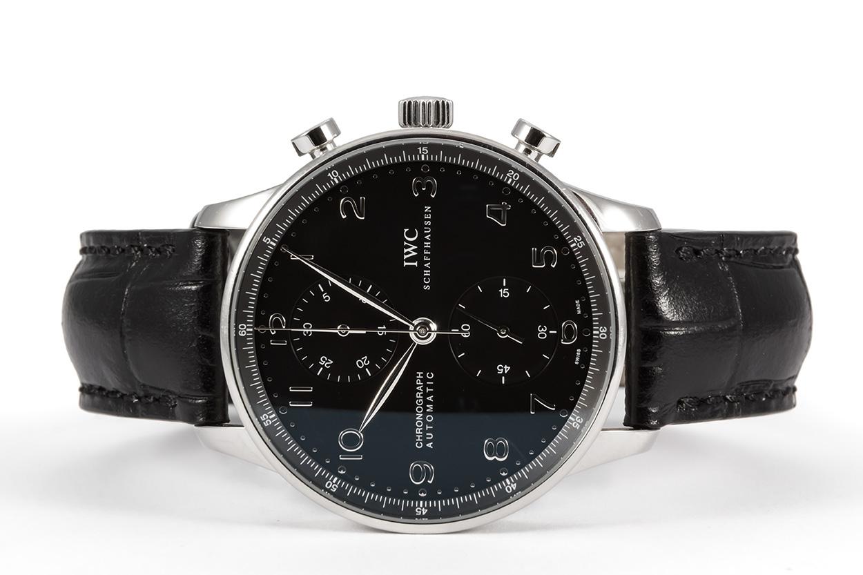 We are pleased to offer this 2008 IWC Portuguese Chronograph Automatic Stainless Steel Watch IW371418. It features a 41mm stainless steel case, black dial, self winding automatic movement with chronograph function and sapphire crystal. The watch