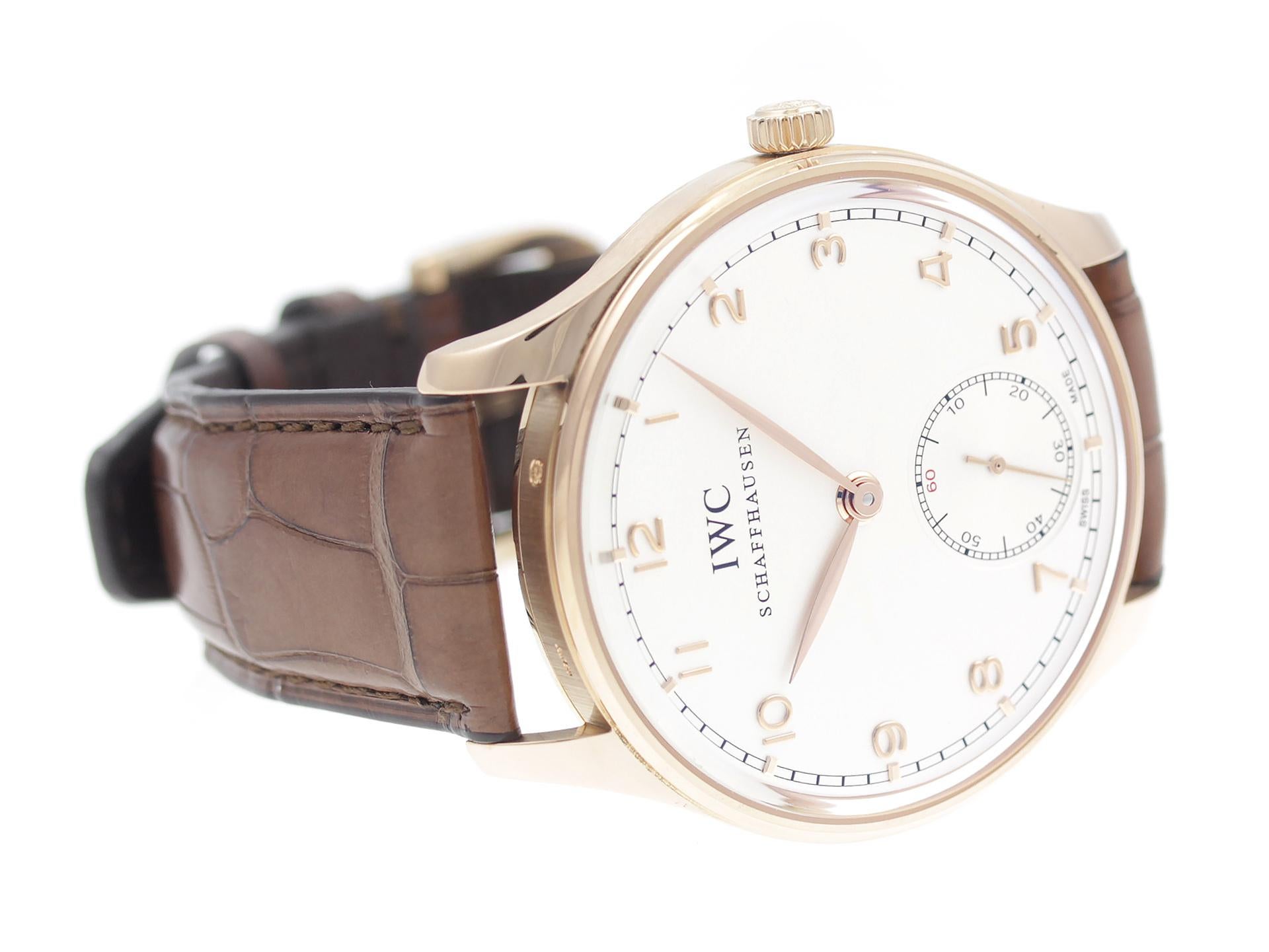 18K Rose Gold IWC Portuguese IW545409 watch, water resistance to 30m, with leather strap.

Watch	
Brand:	IWC
Series:	Portuguese
Model #:	IW545409
Gender:	Men’s
Condition:	Excellent Display Model
Box/Papers:	Gift Box, 2 Year Store