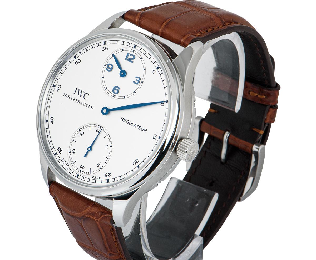 A 43 mm Stainless Steel Portuguese Regulateur Gents Wristwatch, silver dial, small seconds at 6 0'clock, hour display at 12 0'clock, blued steel hands, a fixed stainless steel bezel, an original brown leather strap with an original stainless steel