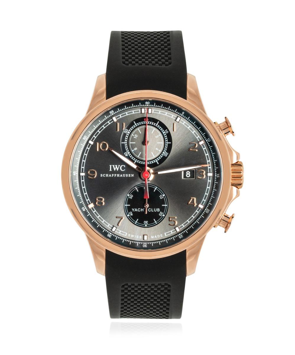 A rose gold 45mm Portuguese Yacht Club Wristwatch by IWC. Featuring a grey dial with applied arabic numbers, a date aperture and chronograph counters.

Equipped with an IWC black rubber strap and an original rose gold deployant clasp. The watch is