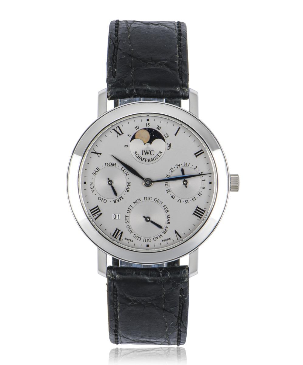 A men's unworn Romana Perpetual Calendar 36mm wristwatch crafted from platinum, by IWC. Featuring a distinctive silver dial with roman applied numerals and four subdials that features the day, date, month, moon phase display and a year aperture.