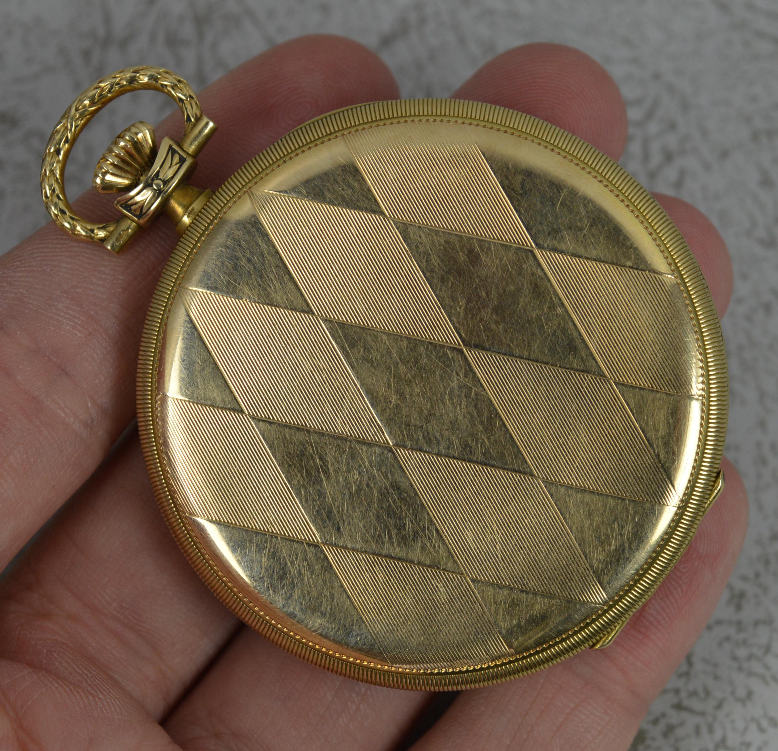 A superb IWC pocket watch. Solid 14 carat yellow gold example. Diamond shaped finish to reverse with plain and engine turned pattern. Attractive leaf like pattern to sides and top. Very clean hand wound mechanism. Art deco period piece.

Condition ;
