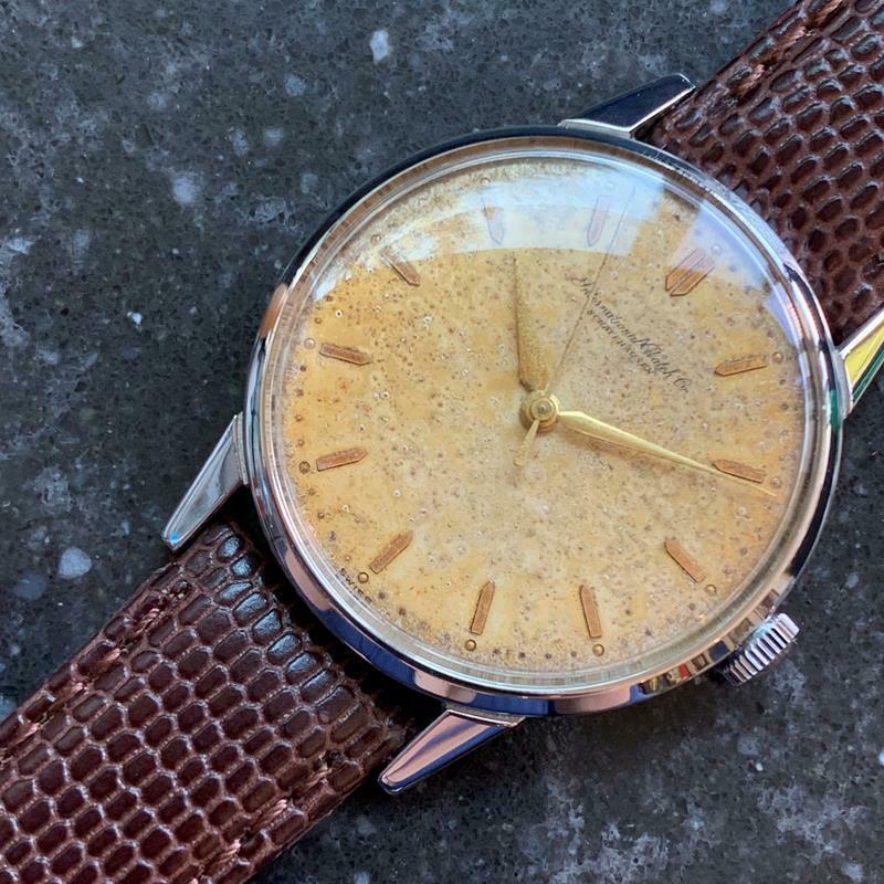 Vintage excellence, men's IWC, International Watch Co. Schaffhausen, cal.89 manual wind, c.1960s. Verified authentic by a master watchmaker. Gorgeous, original unrestored IWC tropical dial, applied gold dagger numeral hour markers, gold minute and