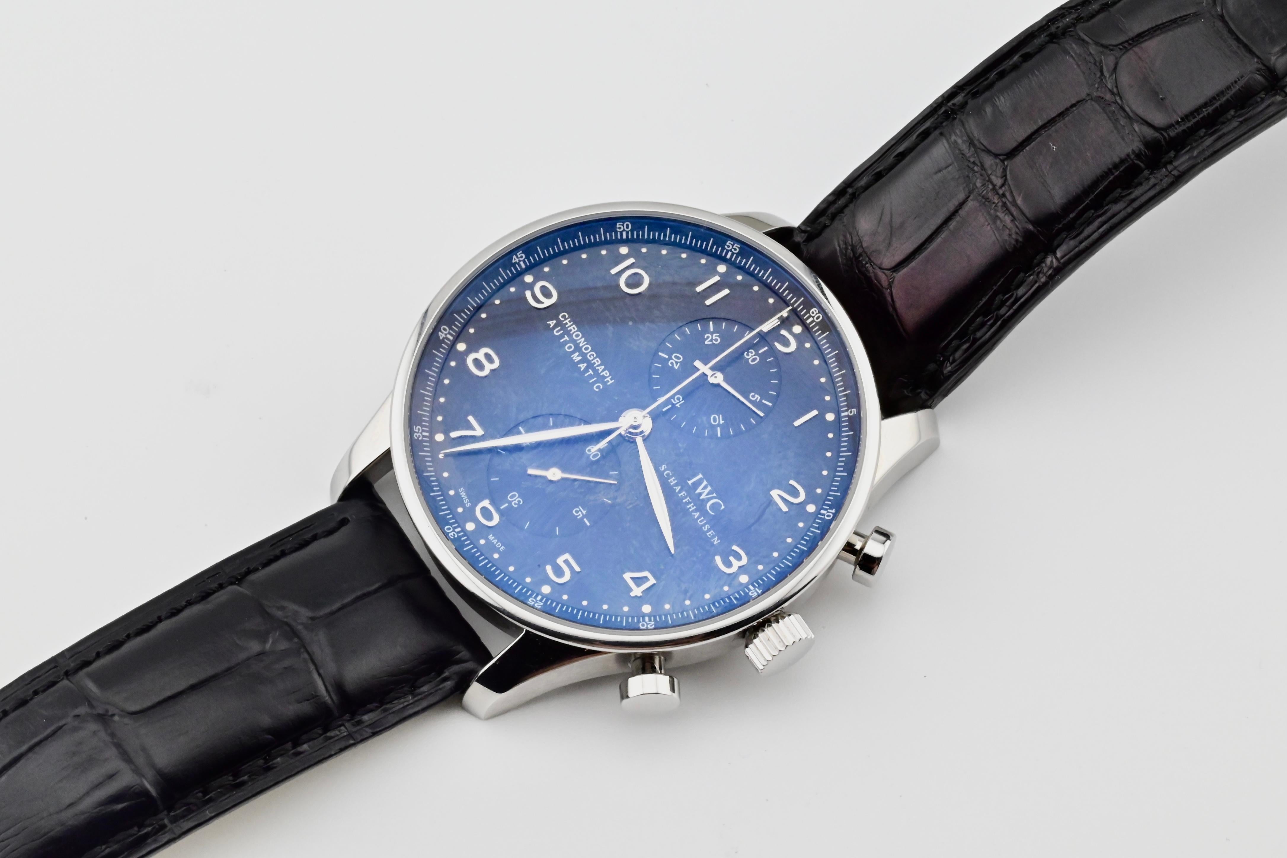 This is an IWC Schaffhausen portugieser chronograph watch, IW371609, and it’s truly a timeless piece. This watch uses an automatic movement, and has a sapphire crystal watch dial. It weighs 88 grams, and is 11 inches full length (including the