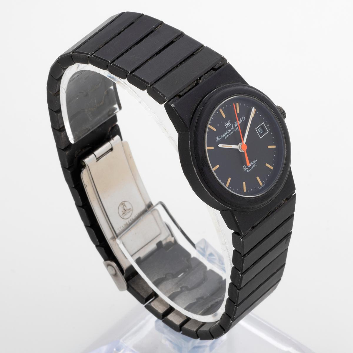 Our vintage ladies quartz IWC SL Design features a 26mm black/ titanium case and black/ titanium bracelet with steel clasp. Very much in the style of Porsche design, we date manufacture to c. 1985. Presented in good condition, there are signs of use