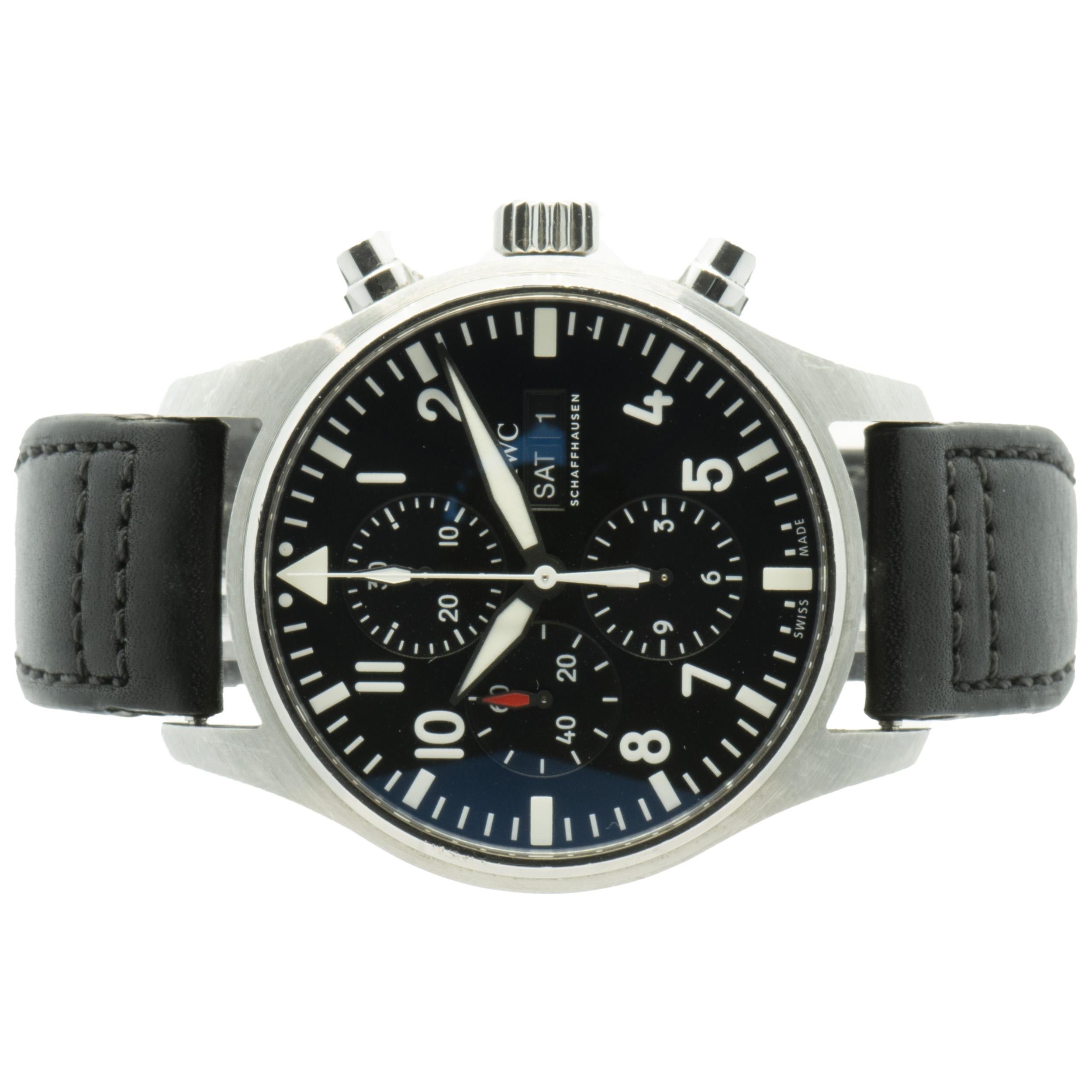 Brand: IWC
Movement: automatic
Function: hours, minutes, seconds, day, date, chronograph
Case: 43mm round case, sapphire crystal, push/pull crown, smooth bezel
Band: black IWC leather strap, buckle
Dial: black arabic/chronograph
Reference #: