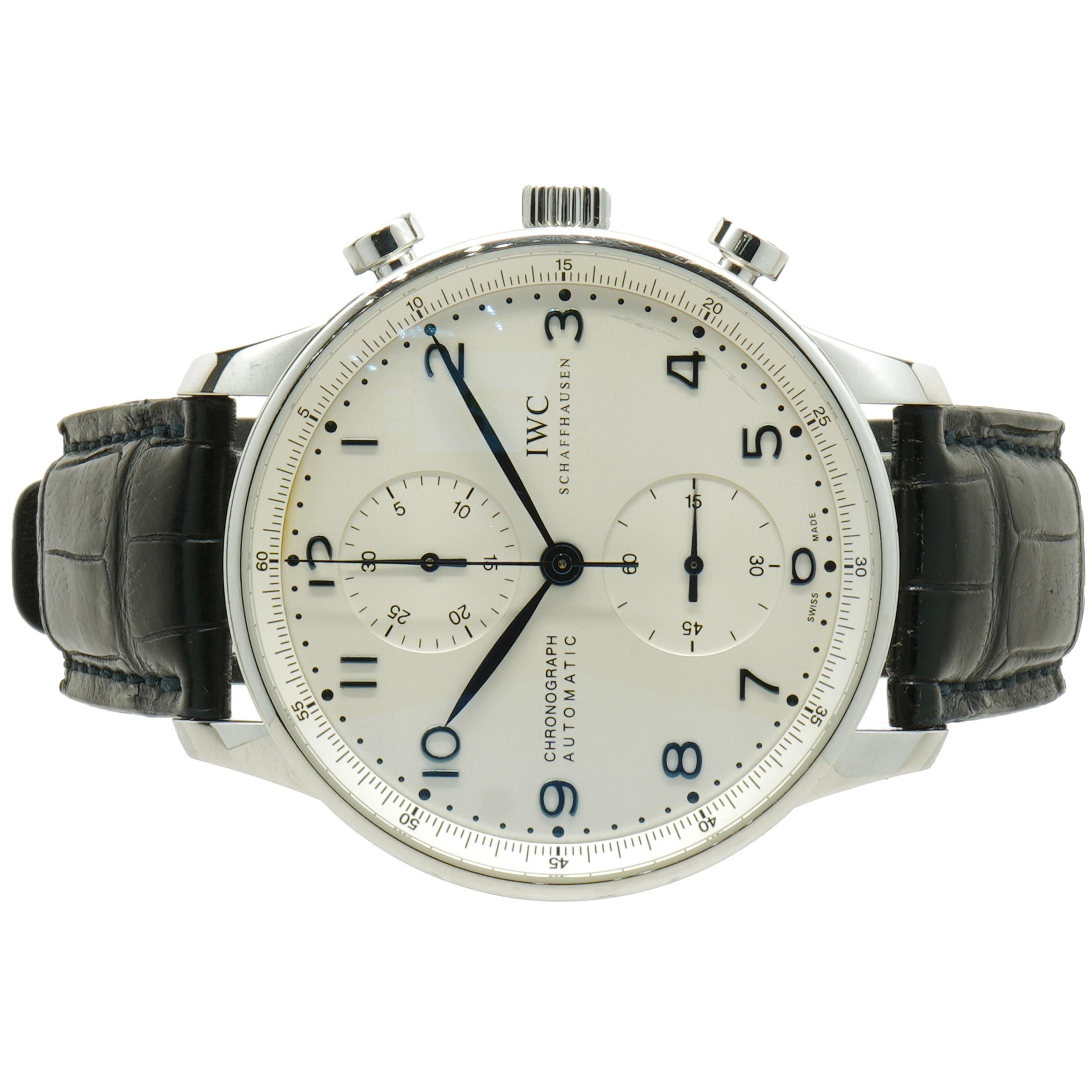Movement: automatic
Function: hours, minutes, seconds, date, chronograph
Case: 41mm stainless steel case, sapphire crystal, push/pull crown
Band: IWC black leather
Dial: silver arabic
Reference #: IW371417
Serial #:
