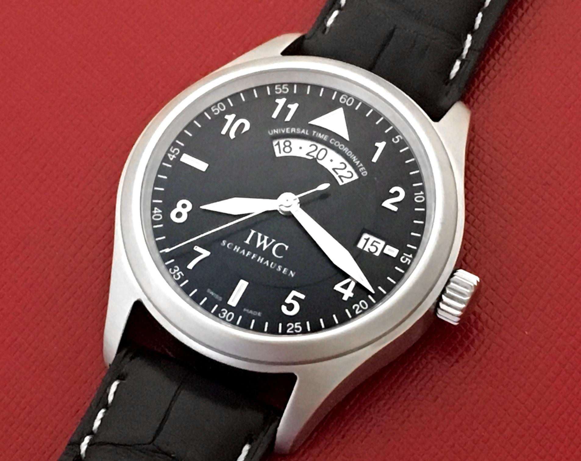 International Watch Company UTC Universal Time Coordinated with 24 Hour Display movement. Model 3251. Certified Pre Owned and ready to ship! Black Dial with polished markers and Arabic numerals and Stainless Steel waterproof style case (39mm dia.).
