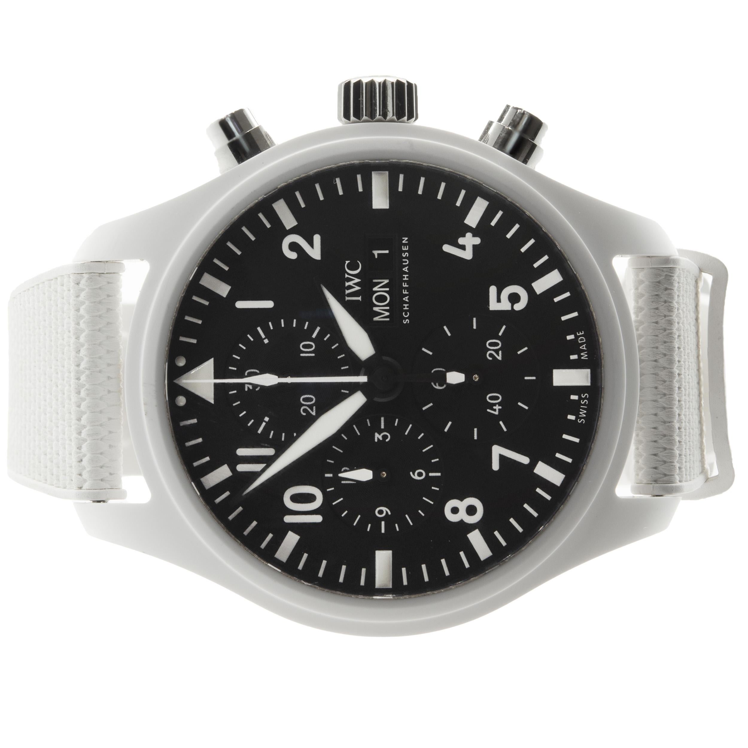 Brand: IWC
Movement: automatic
Function: hour, minutes, seconds, day, date, chronograph 
Case: 44.5mm ceramic round case, sapphire crystal, push/pull crown
Band: white rubber strap, foldover IWC buckle clasp
Dial: black chronograph 
Reference #: