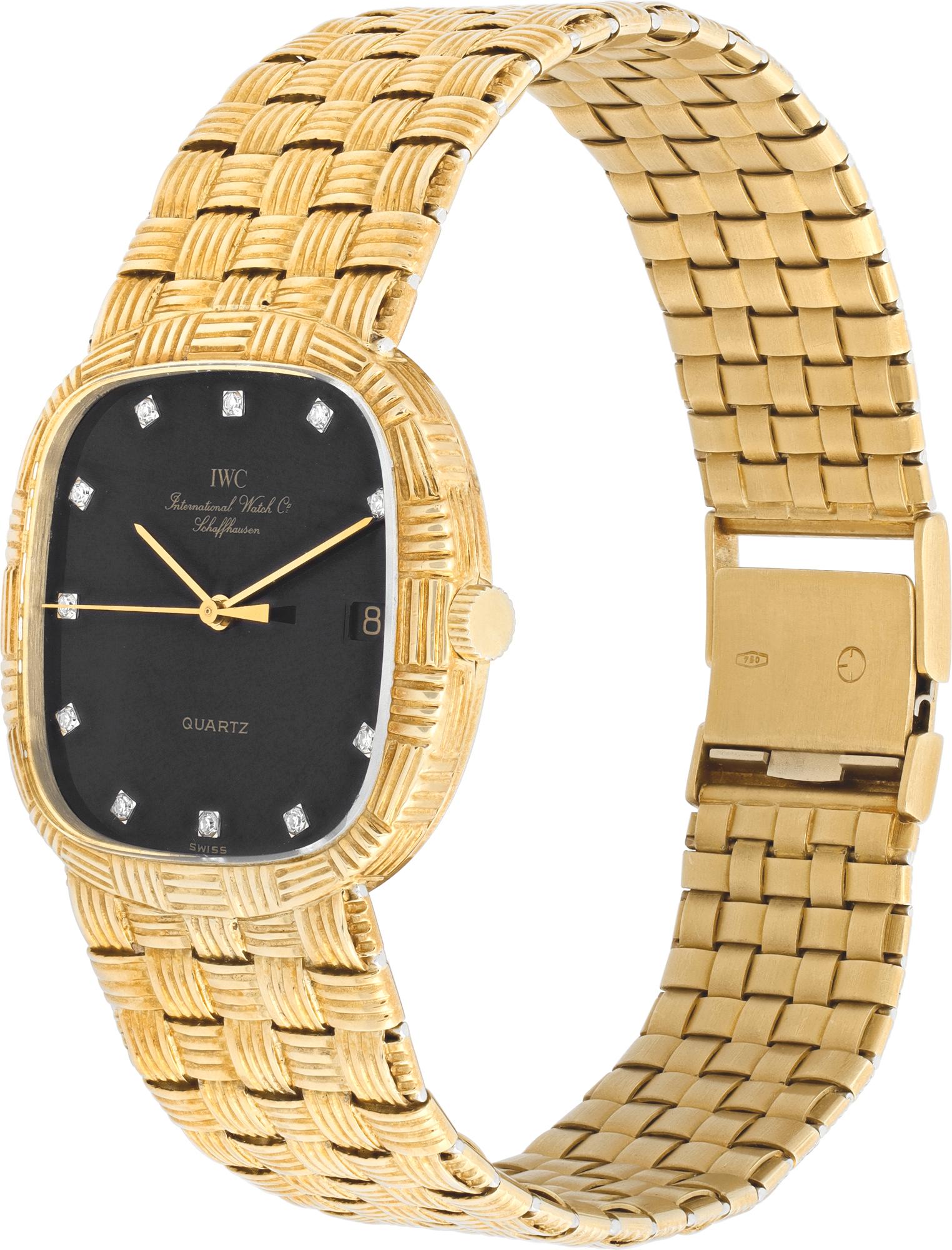 IWC in 18k yellow gold with iconic basket weave bracelet and factory original black diamond dial. Quartz w/ sweep seconds and date. 32 mm case size. Ref 3732. Fine Pre-owned IWC Watch.

 Certified preowned Dress IWC 3732 watch is made out of yellow