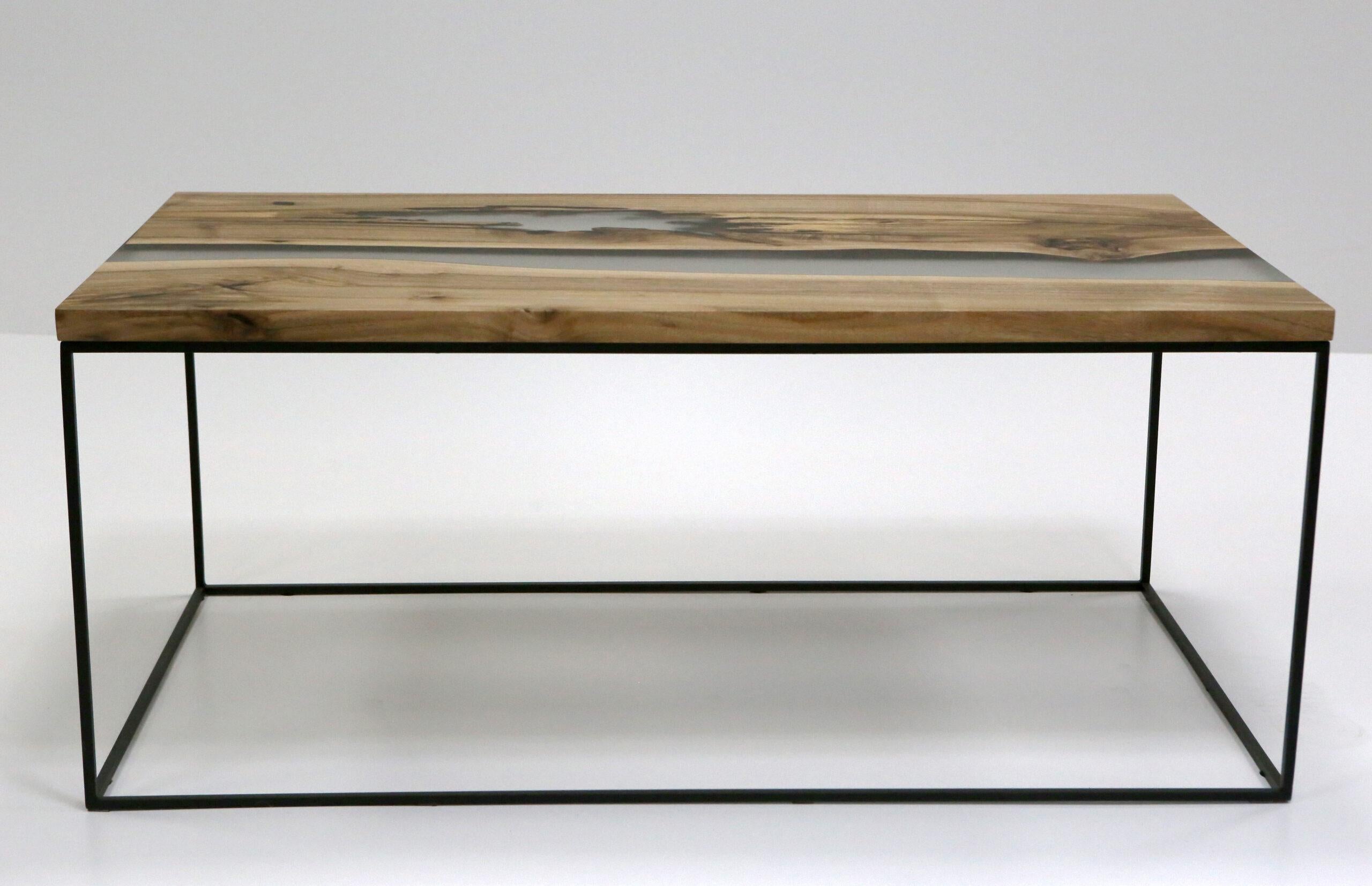 Izzy Matte Coffee Table by KV Design
One Of A Kind
Dimensions: D 62,5 x W 114,5 x H 49 cm.
Materials: Walnut, transparent epoxy, and metal.

Everything is custom-made 1 of 1 edition. Please contact us.

KV Design is a team of professionals, and we