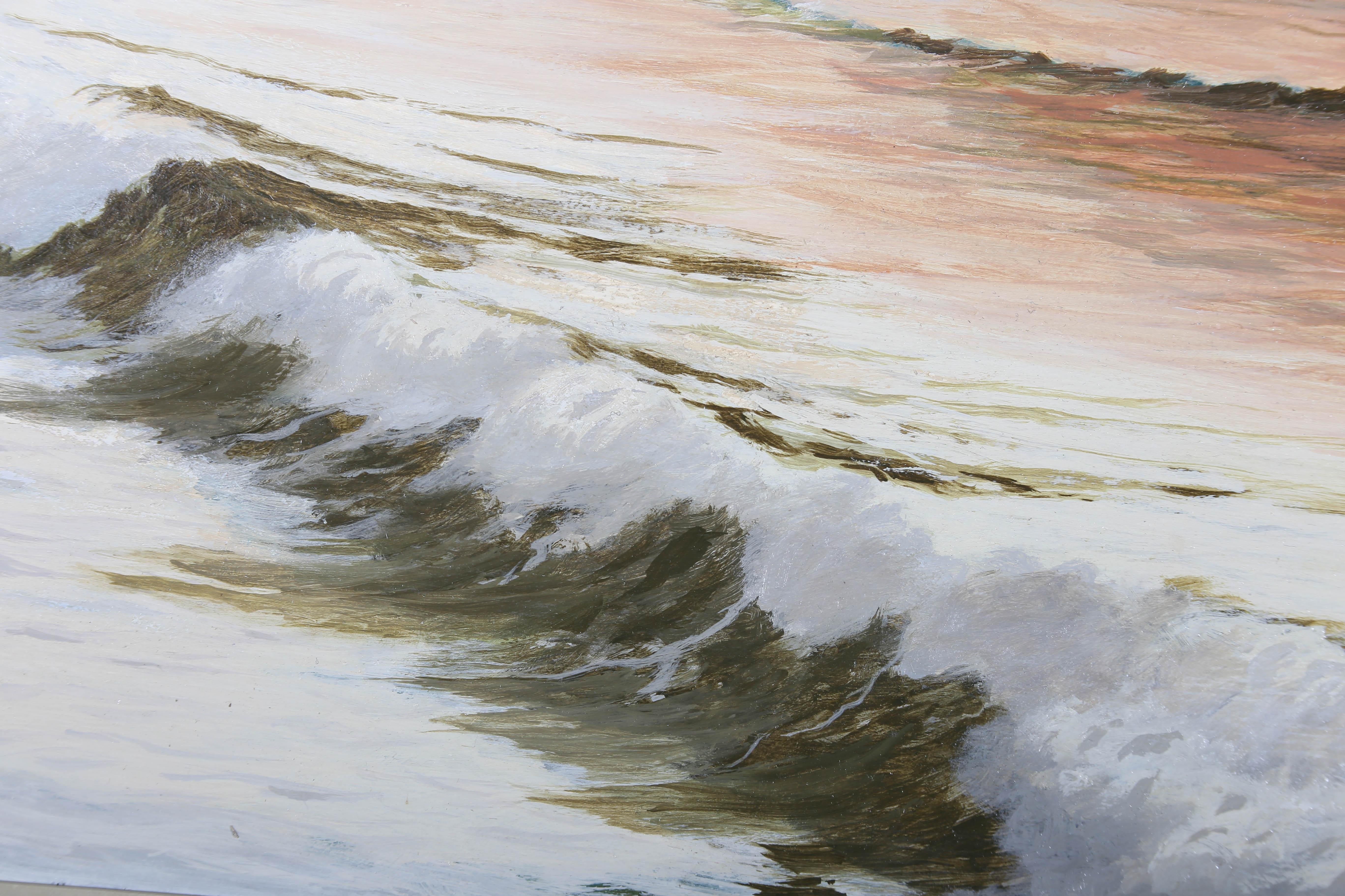 A beautiful coastal seascape with dramatic white tipped waves crashing on imposing cliffs. The waves have a beautiful opaque green at the shore line that fades into blush pink as the sun sets on the water in the distance. The artist has signed to