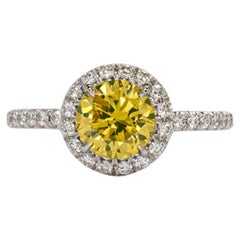 J. Brilliante 0.93 Carat Fancy yellow Round Brilliant Cut Diamond Halo Solitaire