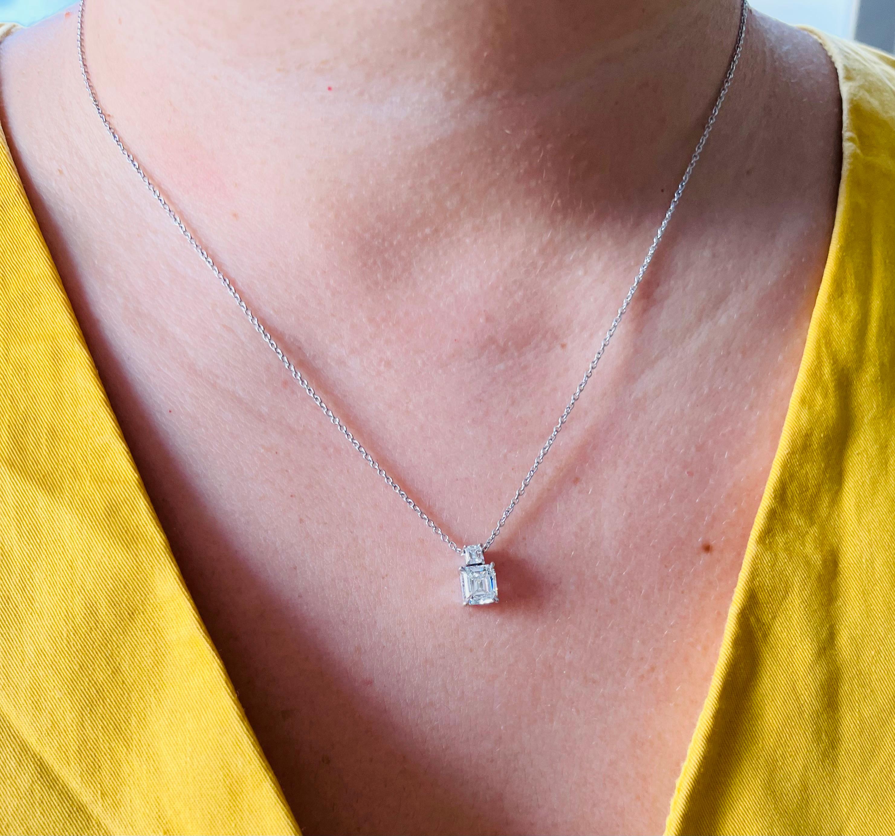 This elegant pendant is a lovely everyday piece and also makes enough of a statement styled for special occasions. The necklace features a GIA certified G color, VS1 clarity 0.90 carat emerald cut diamond. It's stacked with a 0.10 carat emerald cut