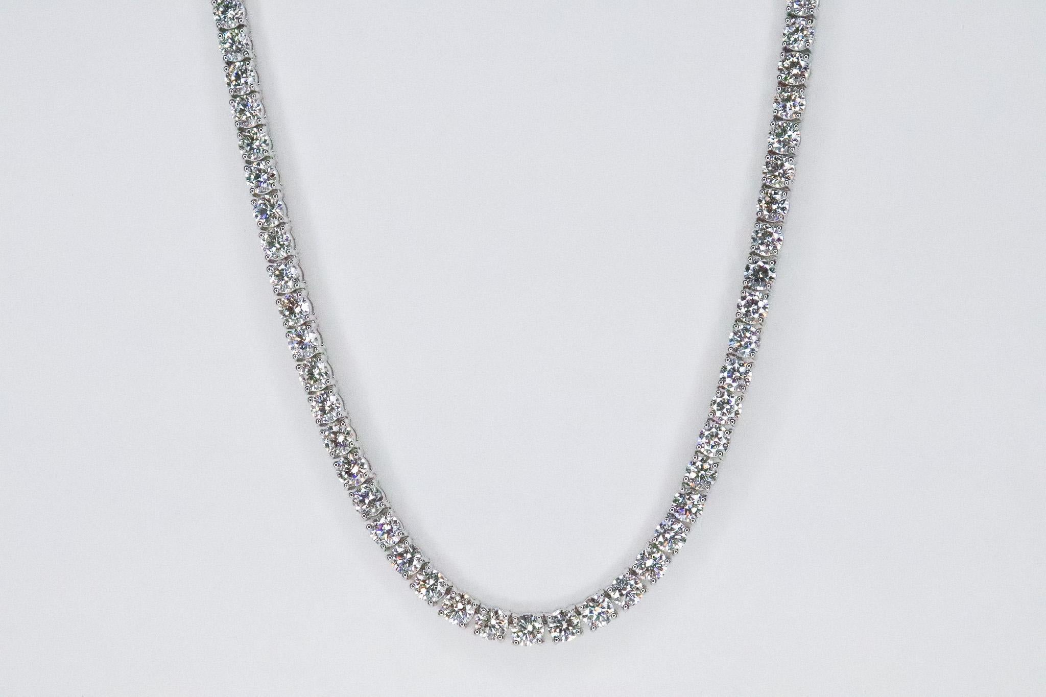 Elevate any look with our stunning J. Birnbach 16.38 Carat Diamond Tennis Necklace. Handmade in 18K white gold, this piece features 109 meticulously set round brilliant diamonds that sparkle with unparalleled brilliance. Measuring 16.5 inches in