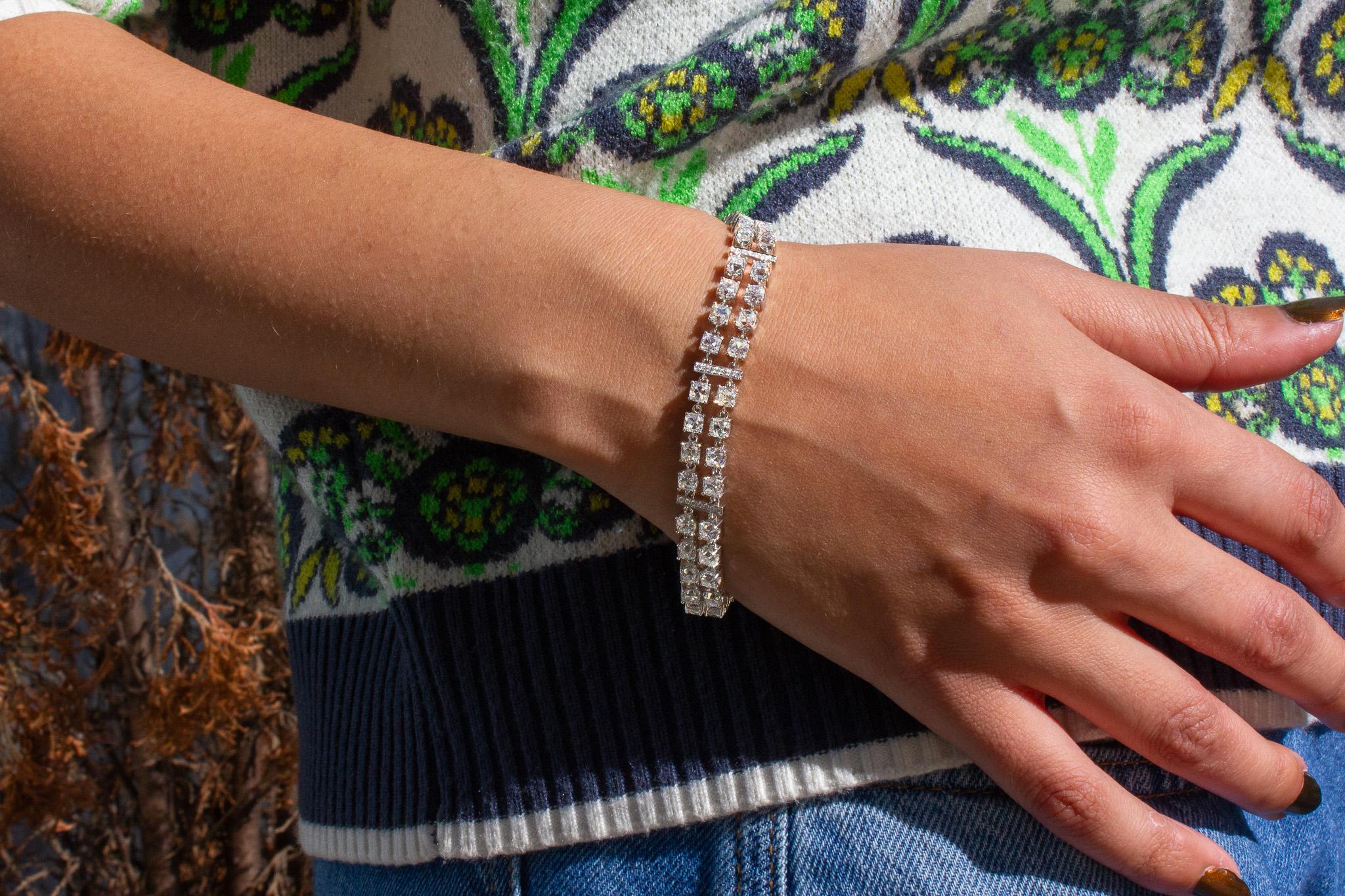 Indulge in timeless elegance with this exceptional J. Birnbach Platinum Double-Row Old Mine Diamond Bracelet, featuring a total of 18.13 carats of stunning diamonds. This luxurious bracelet is designed with 56 Old Mine cut diamonds, totaling 17.68