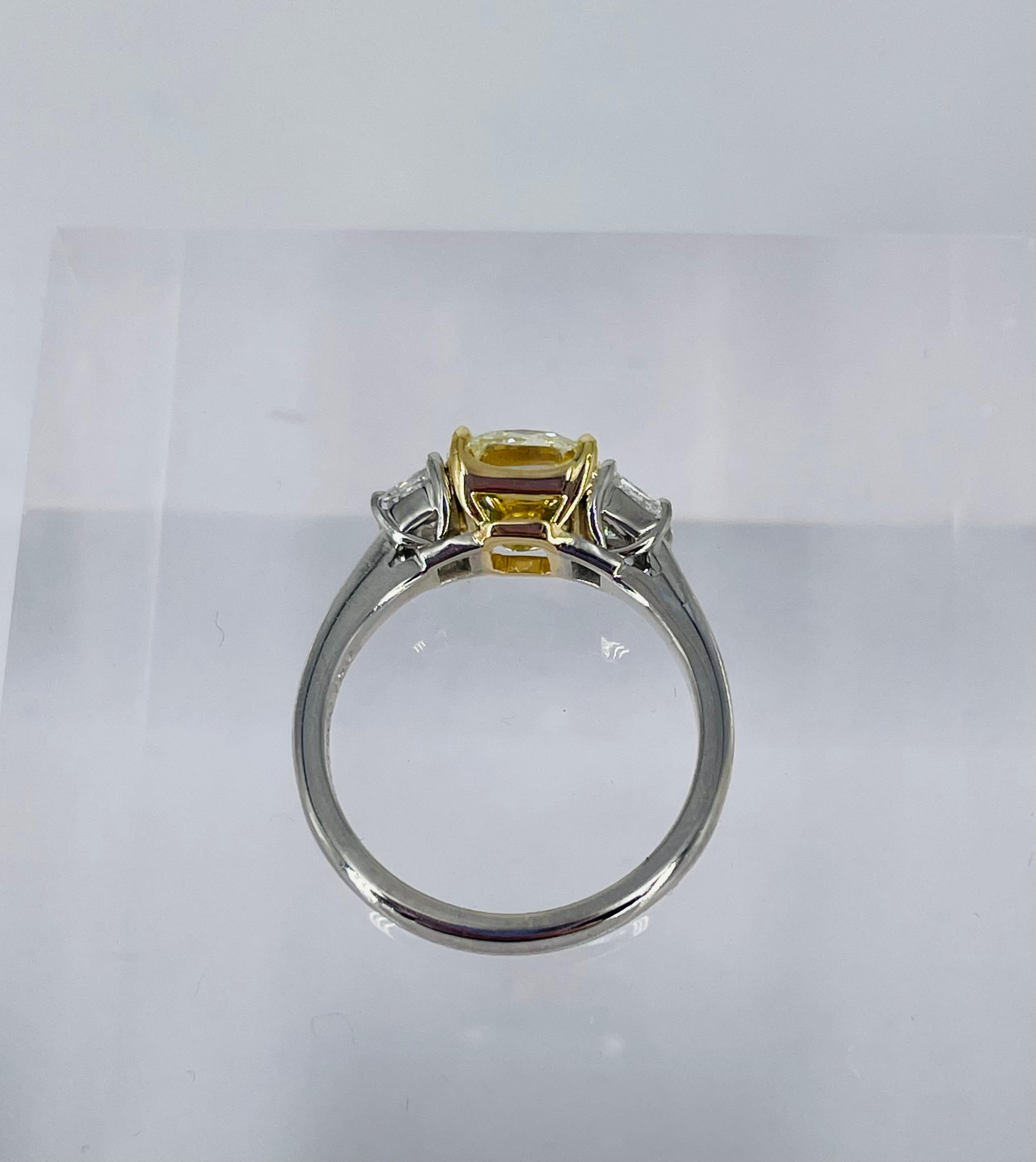 J. Birnbach 2.17 carat Cushion Cut Yellow Diamond Three Stone Ring In New Condition For Sale In New York, NY