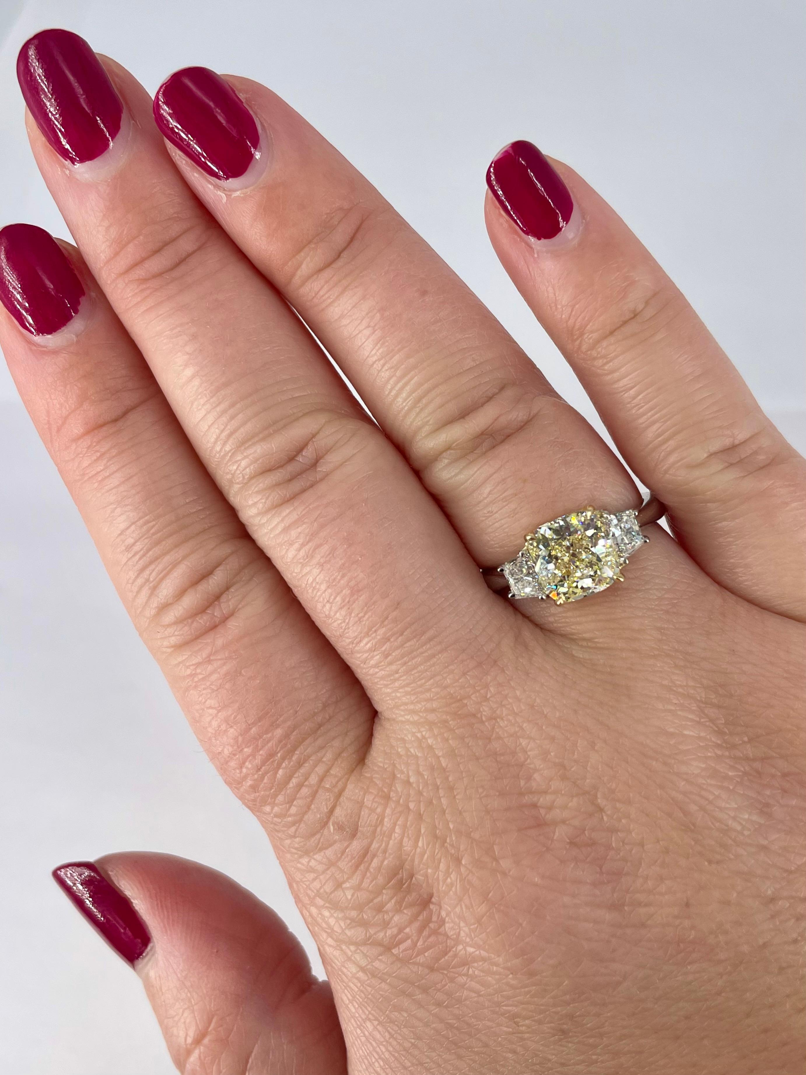J. Birnbach 2.17 carat Cushion Cut Yellow Diamond Three Stone Ring In New Condition For Sale In New York, NY
