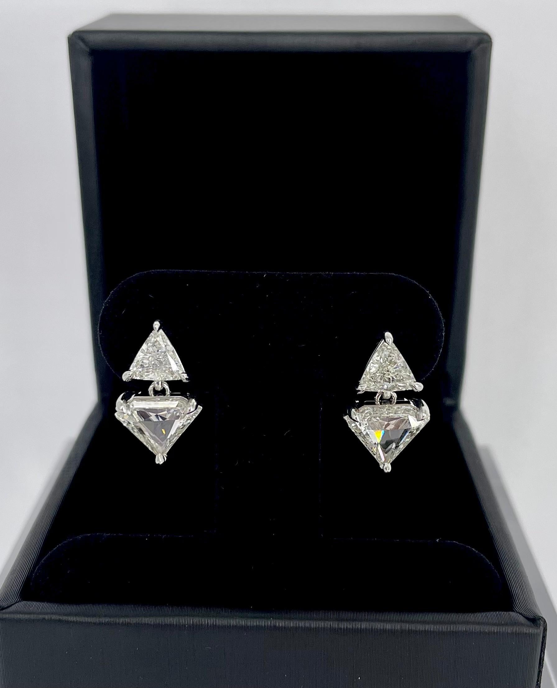 Edgy or elegant, there are so many ways to style this unique pair of diamond drop earrings. The earrings feature trillion cuts set in the stud, and a diamond shape drops just below the ear. Trillions are a sparkly, brilliant cut triangle shape, and