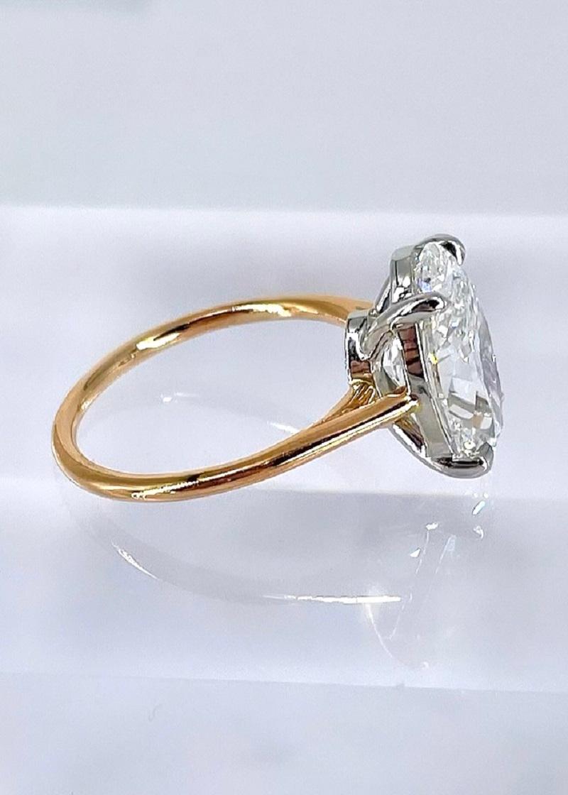 This solitaire by J. Birnbach features an exquisite 3.92 carat oval diamond certified by GIA to be D color and SI1 clarity. D is the highest possible and therefore rarest color, so this is a very special stone. The diamond is very lively and a