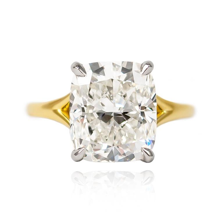 This new beauty from the J. Birnbach vault will make them stop and stare! Featuring a scintillating 6.01 carat Cushion Modified Brilliant of J color and VS1 clarity, this diamond is set in a handmade 18K Yellow Gold & Platinum split shank ring.