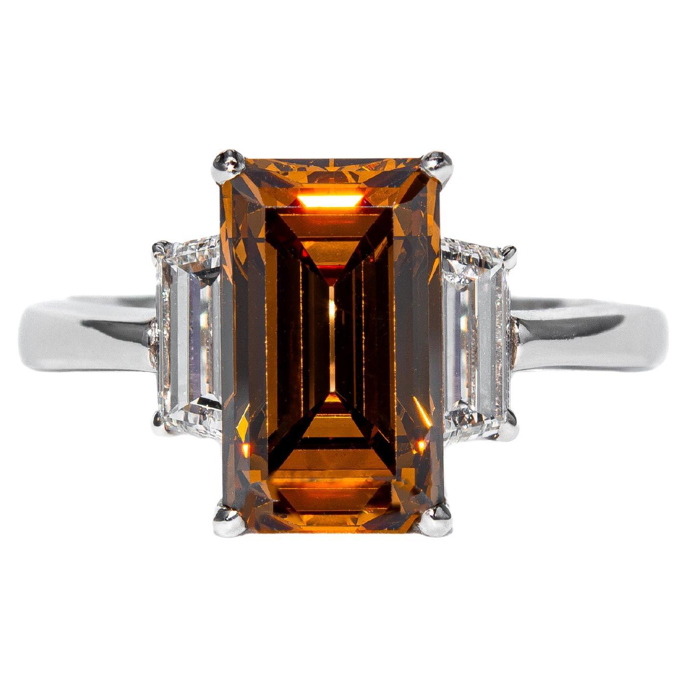 J. Birnbach GIA 2,70 ct Fancy Orangy-Brown Step Cut Diamond Bague à trois pierres en vente