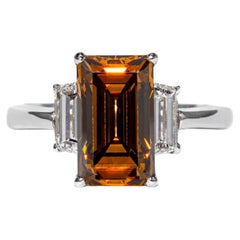 J. Birnbach GIA 2,70 ct Fancy Orangy-Brown Step Cut Diamond Bague à trois pierres