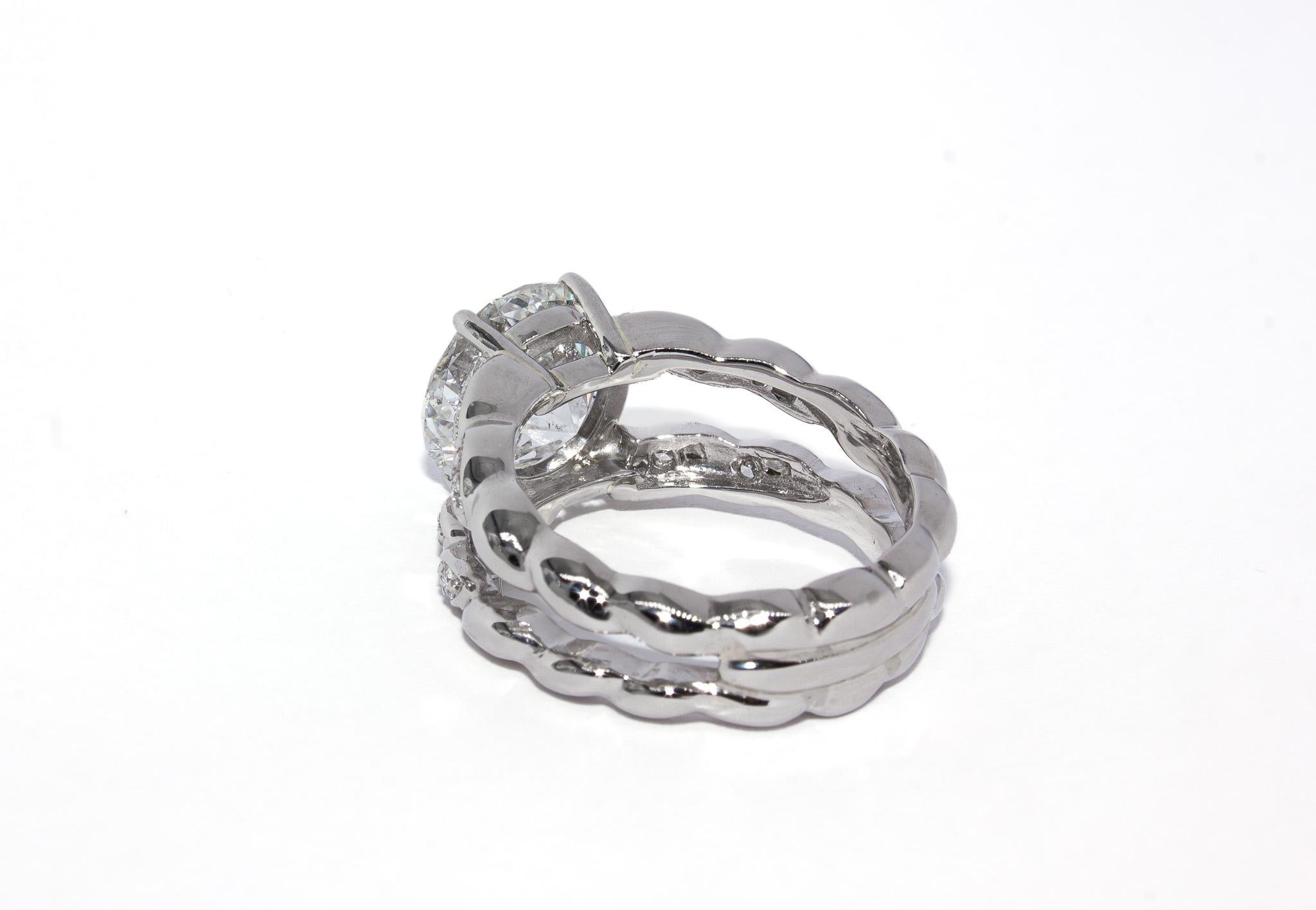 Femenino o masculino J. Birnbach GIA 4,24 quilates F SI1 Diamante redondo talla brillante Anillo de doble caña en venta