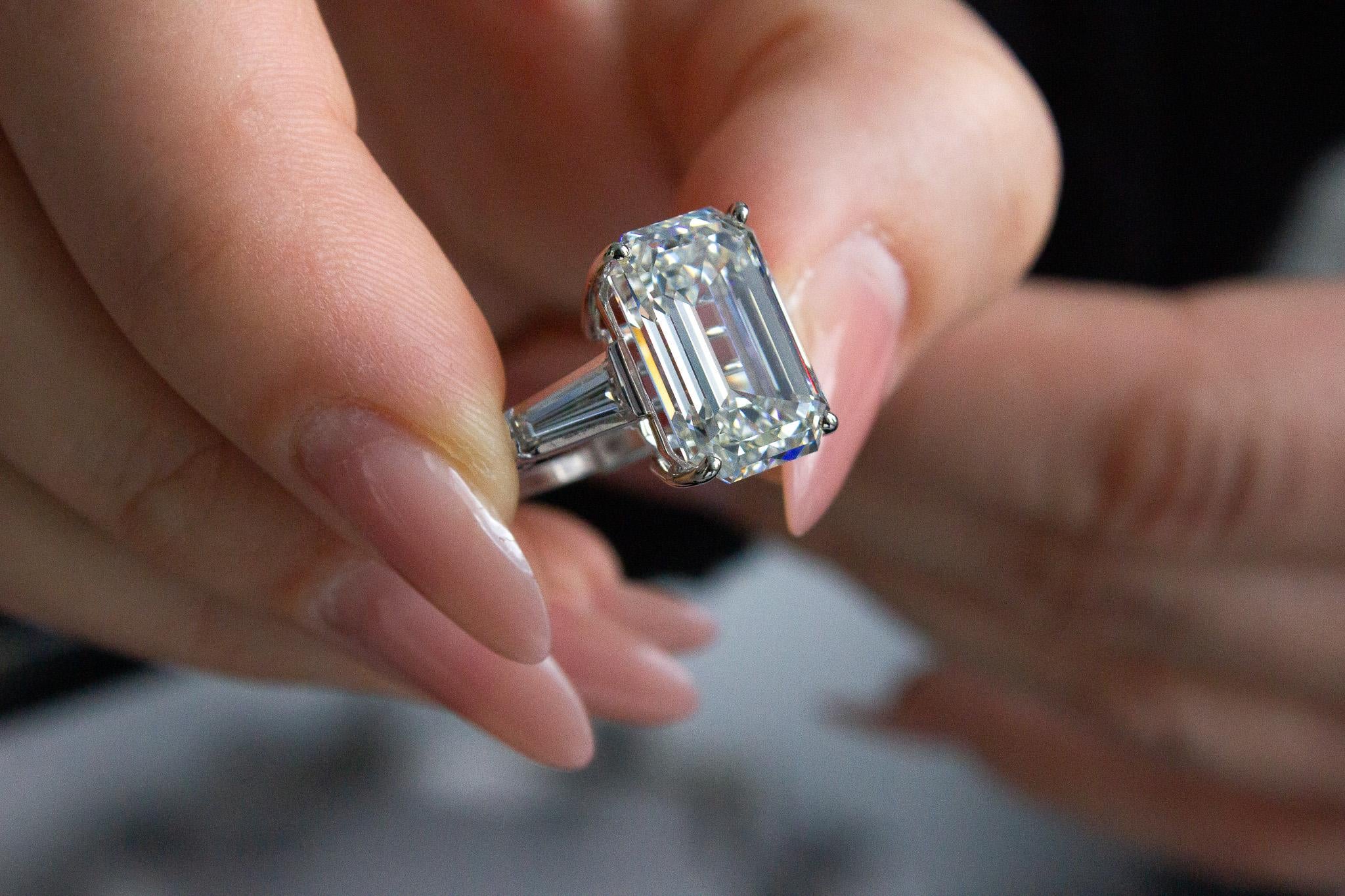 Contemporary J. Birnbach GIA Certified 10.22 Carat J VS1 Emerald Cut Diamond Three-Stone Ring For Sale