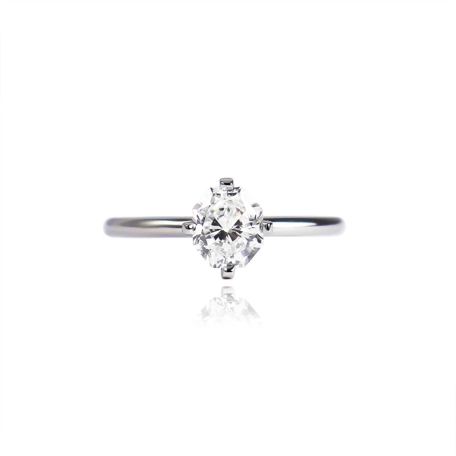 This sweet ring fresh from the J. Birnbach workshop features a GIA certified 1.03 carat radiant cut diamond of F color and VS1 clarity. With wide corners beautifully framed by NSEW tab prongs, this charming stone is as unique as it is beautiful! The