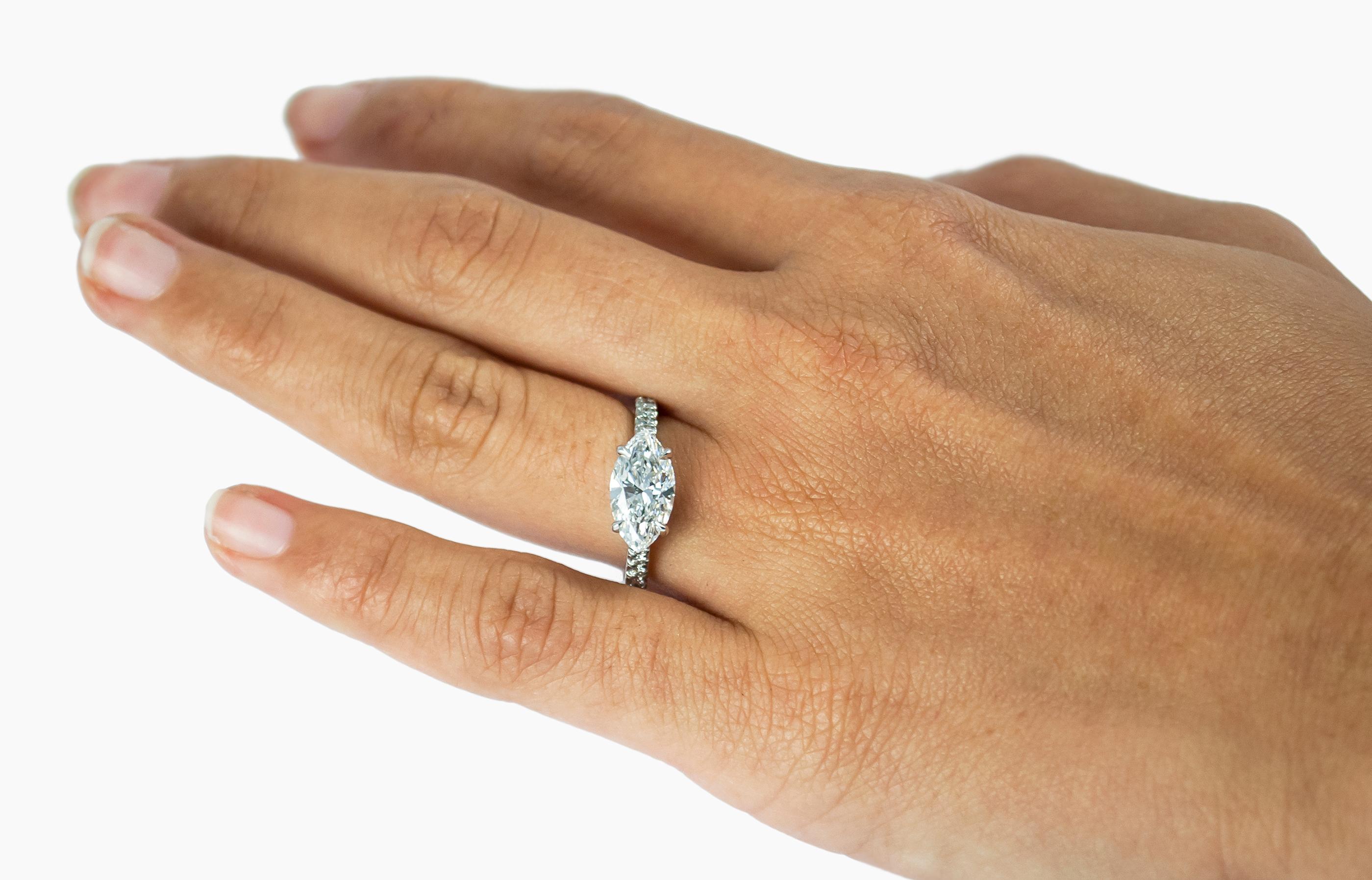 This J. Birnbach marquise cut diamond ring is beautifully unique. Set east to west, it spreads across the finger nicely and is a truly gorgeous piece - contemporary and charming. Set in platinum with a diamond pave shank. 

This piece comes with a