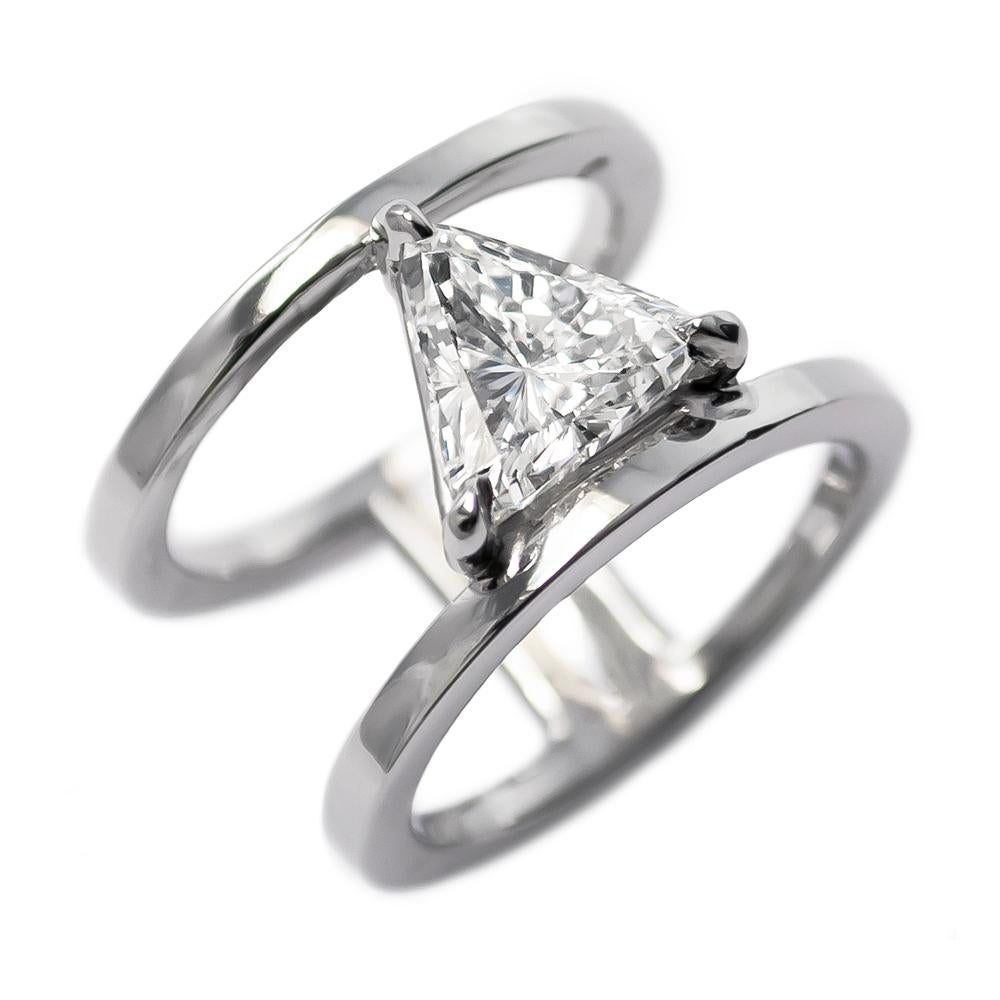 This edgy and contemporary piece fresh from the J. Birnbach workshop features a scintillating, GIA certified 1.68 ct Modified Triangular Brilliant diamond of J color and VS1 clarity. Set within a double shank platinum ring, this piece is a perfect